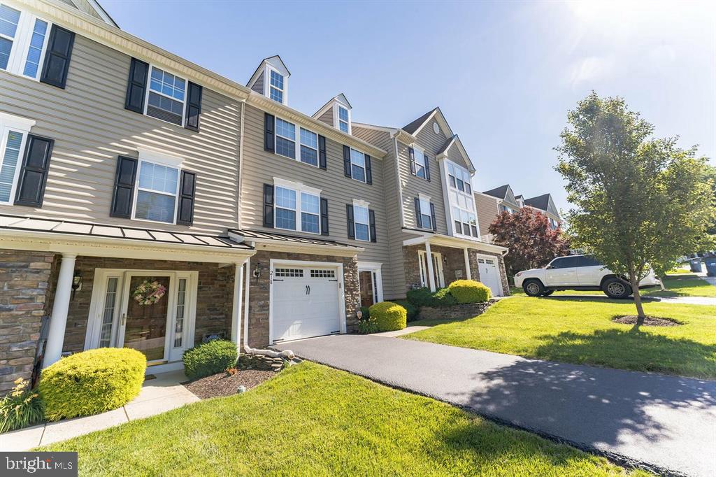 Available starting September 1st. Welcome to a fabulous, upgraded, open concept townhome in the beautiful community of Tall Trees in the award-winning Downingtown School District with access to the STEM Academy. Enter the home into a lower-level foyer that leads to the spacious finished basement which has gorgeous hardwood floors and can be used as a multi-purpose family room or bonus room or work out area. This floor includes powder room and a laundry room. Heading up to the open main floor you will find a gorgeous kitchen with upgraded cabinets, stainless steel appliances, Corian countertops and an island that opens right into the family room featuring a gas fireplace and access to a Trex deck with views of green space. This floor also leads to a formal dining room and spacious living room with an office nook. Heading up to the third floor you will find the master bedroom with large walk-in closets and a master bath, stall shower and soaking tub. There are two other nicely sized bedrooms on this floor, which are serviced by the hall bath. This move in ready home, has lots of upgrades including newer carpet on the stairs/bedroom, built in surround sound, a great location with ample parking slots and play area for children in front of the house. Carefree living as HOA manages lawncare and snow removal. Few minutes from shopping (Wegmans, Giant, Target, CVS, Wawa, Best Buy, Dicks etc.) dining, and entertainment (movies, bowling) and Bell Tavern Park (basketball, waterpark, volleyball, tennis, running track.) Easy access to RT113, RT30, RT202, RT100 and the PA Turnpike. Pets conditional. Property professionally managed by Property Management of Chester County. Call today!