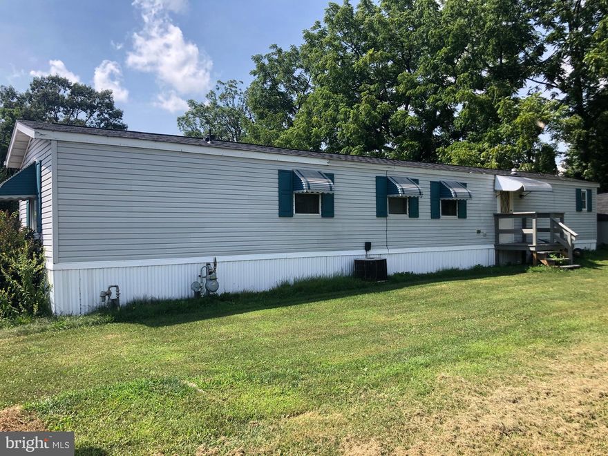 This 2 bedroom, 2 full bath home is located in The Village at Pleasant Hills and has a large living, dining, and kitchen area. Nice covered front porch, storage shed, and off-street parking for two cars. This home has economical gas heat and central air and a new roof from July 2020. Why rent when you can own?