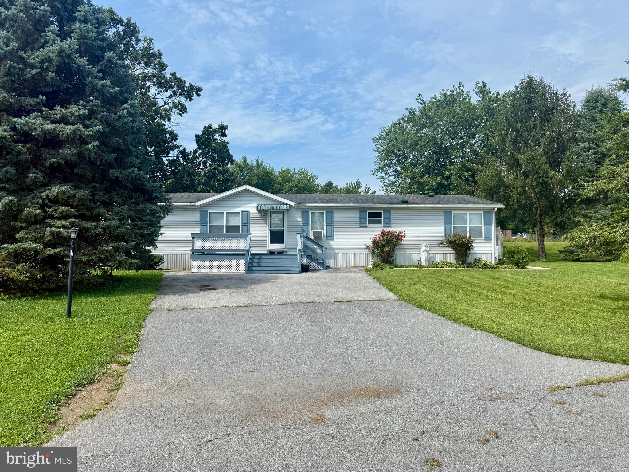 Welcome to this well-maintained 3-bedroom, 2-bathroom mobile home located in Warm Spring Estates in Chambersburg, PA. This home features an open-concept living arrangement and a spacious layout. It includes a large yard, off-street parking, and is conveniently located near schools, shopping, and Interstate 81. The home also boasts new appliances and a deck. Please note that buyers must be approved by the Warm Spring Estates park management, and the buyer's agent must verify the taxes.