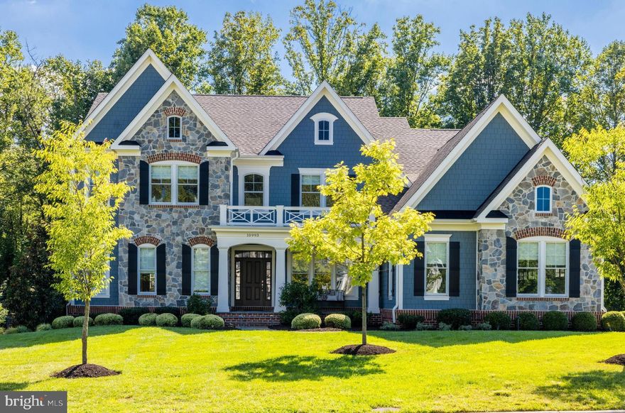 Presenting 10993 Tradewind Ct, a modernized oasis sited on nearly one-acre of pristinely landscaped land and custom built in 2017 by Sekas, offering 6,600 SF of refined living spaces. This property features exceptional upgrades throughout, including 10-foot ceilings, designer lighting, stone countertops, elevator to all three levels, main-level primary suite and a upper level primary suite, wood flooring throughout, designer window treatments, and so much more. 

...

The MAIN LEVEL features expansive Anderson windows and soaring 10-foot ceilings that create an outpouring of natural light throughout. The floor plan features a formal dining room, family room with gas fireplace, beautifully renovated kitchen, breakfast room that leads to a three-seasons room with a heater, as well as a morning room offering exceptional serenity and peace. The main level is complete with a primary suite with pocket doors to the two closets, and expansive bathroom; as well as the laundry room, powder room, walk-in pantry, three closets, and a mudroom.
...

On the UPPER LEVEL is the second primary suite with custom built-ins, two closets, and a primary bathroom. There is a bedroom with an en-suite bathroom, and two other bedrooms with a shared bathroom, all with large closets, and a large linen closet in the hallway.  This floor of the home features 9-foot ceilings, wood flooring throughout.

...

On the WALK-OUT LOWER LEVEL are multiple expansive windows, bringing in exceptional natural light. The recreation room offers a myriad of opportunities for space, plus custom-built ins, a gym with custom flooring, additional Den with a large closet and a full bathroom, along with a bonus or flex space room, plus ample storage space.
 
...

The EXTERIOR of the home offers professionally designed landscaping and outdoor lighting, an expansive flagstone patio with a fire pit and seat wall, plus the three seasons room, irrigation system with rain sensor, and plenty of room for a pool! This property is sited just minutes to downtown Oakton, I-66, the Town of Vienna, Tysons, and more!