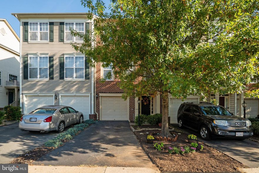 Beautiful updated townhouse backing to trees in sought after Victory Lakes!  Enjoy hardwood floors on the entire kitchen level.  Open concept kitchen features granite counters, stainless steel appliances and recessed lighting.  Spacious owner's suite offers volume ceiling with ceiling fan, large walk in closet, and updated bath offering frameless shower, separate soaking tub, double sinks and comfort height vanity.  2 additional bedrooms, hall bath and laundry room are located on the top level.  Finished lower level offers a rec room and half bath.  Enjoy the partially fenced backyard, and all of the amenities of Victory Lakes HOA!