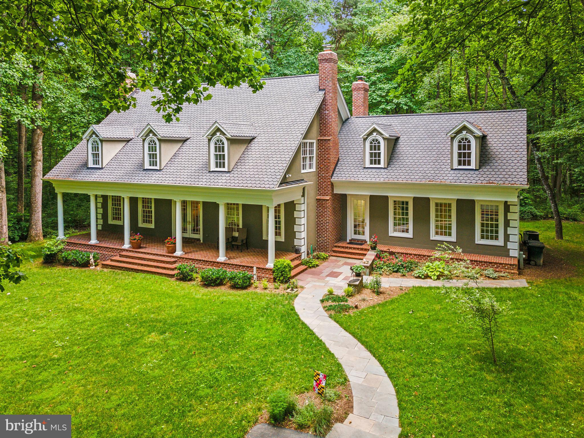 Welcome to 8683 Reservoir Road, where elegance meets tranquility in this stunning 5-bedroom, 4.5-bathroom retreat nestled on a serene 3-acre wooded lot.
As you enter, you'll be greeted by the charm of a classic front porch, inviting you to step inside and discover the warmth and comfort this home offers. The main level boasts a luxurious, renovated primary bedroom suite, providing convenience and privacy, along with an updated primary bath for a touch of modern sophistication.
Entertaining is a delight in the spacious kitchen featuring Ubatuba granite countertops, ample cabinet space, and a surplus of counter space, making meal preparation a breeze. The kitchen seamlessly flows into the living areas adorned with red oak hardwood floors and illuminated by natural light streaming through Pella windows and doors.
Cozy up by one of the three fireplaces on chilly evenings or step outside onto the stone patio at the back of the house, where you can unwind with a glass of wine or host memorable cookouts with friends against the backdrop of nature's beauty. The lush greenery surrounding the property provides a picturesque setting, ideal for nature lovers and birdwatchers.
With over 4000 finished square feet and an additional 3000 square feet of unfinished space in the basement, there's plenty of room for customization and expansion to suit your lifestyle needs. The attic is spacious and perfect for additional storage. Plus, the 50-year architectural roof ensures lasting durability and peace of mind.
Don't miss this rare opportunity to own a piece of paradise in a coveted location. Come experience the allure of 8683 Reservoir Road and make it your own haven for years to come. Schedule your showing today!