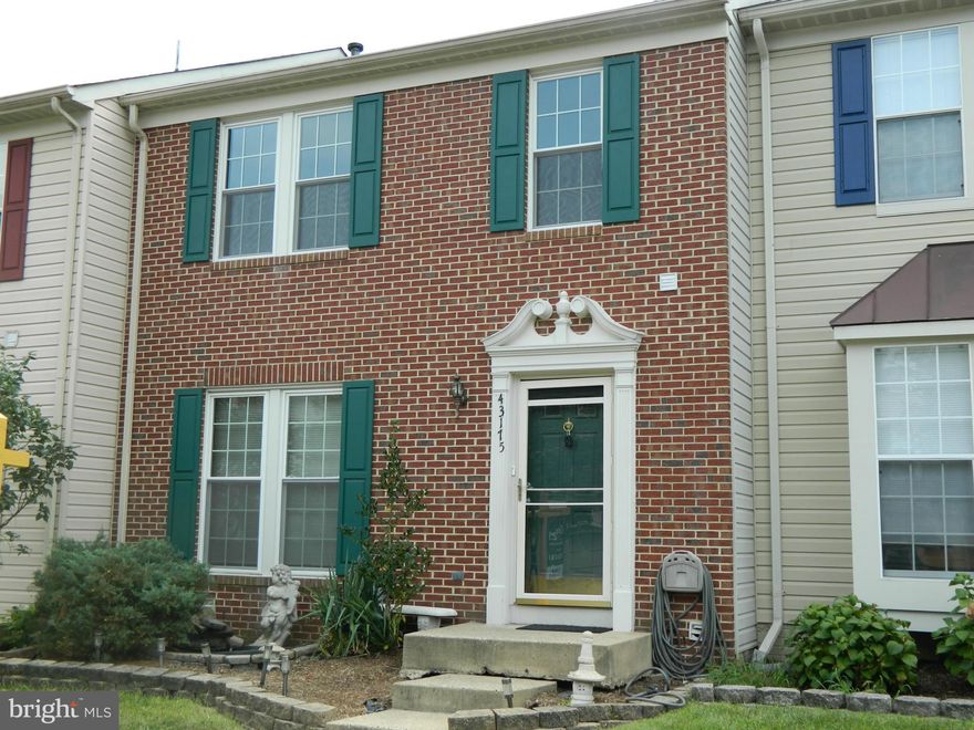 Beautifully done! 3 bedrooms , 2 full baths & 2 half baths. Updated Kitchen ( new wall oven/microwave),  Hand scraped bamboo hardwood floors on main level & upstairs. Roof replaced 2014. Deck with stairs replaced 2013. All new energy saver windows front of TH.2013. Track lighting LR & DR along with crown molding & chair railing. New carpet in basement. Backs to trees & walking trails. Must see!