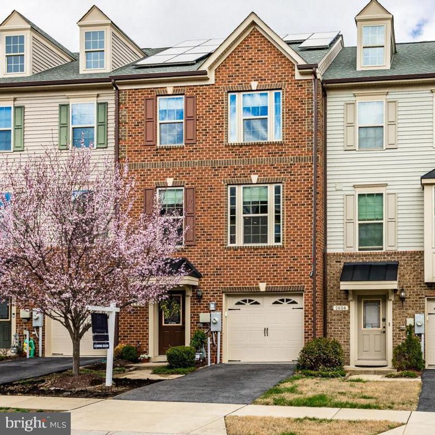 Enjoy modern living in this spacious brick front, three level townhome backing to open space with no rear neighbors. Features include owned solar panels, custom window treatments, built ins, updated lighting, an upper deck, and a walk out lower level with under deck cover, paver patio. VA buyers can assume a 2.5% VA loan.
The bright kitchen offers gas cooking, stainless appliances, a large granite island, pantry, and tiled backsplash. Luxury plank flooring spans the main level and stairs, with new carpet downstairs.
Upstairs, the primary suite includes vaulted ceilings, a walk-in closet with organizers, and an en suite bath with soaking tub, walk in shower, and double sinks. Two additional bedrooms, a hall bath, and laundry complete the level.
Community amenities include a fitness center, pool, clubhouse, trails, dog park, and more. Convenient to Fort Meade, BWI, Arundel Mills, and major commuter routes to Baltimore and DC.