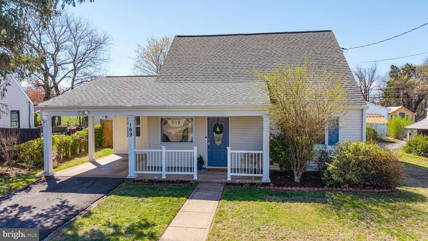 SPACIOUS AND BRIGHT!!!   CHARMING FRONT PORCH.   BONUS CARPORT!! LARGE SOARING TWO STORY FAMILY ROOM WITH NEW SKYLIGHTS.  Hardwood floors.   Main level has two  bedrooms, bathroom with new double sink vanity, and a sunroom addition which could be a fifth bedroom, office or  playroom. Two bedrooms with shared bath on upper level.  Full Dining Room and spacious open kitchen with stainless appliances. New hot water heater (2026)    BIG YARD!  NEW 6 FT PRIVACY FENCE WITH THREE GATES.   LARGE SHED WITH ELECTRICITY AND A PATIO!  Near Old Town Manassas with many restaurants, shops and activities and near both Manassas City Rail station and Manassas Park Rail Station!