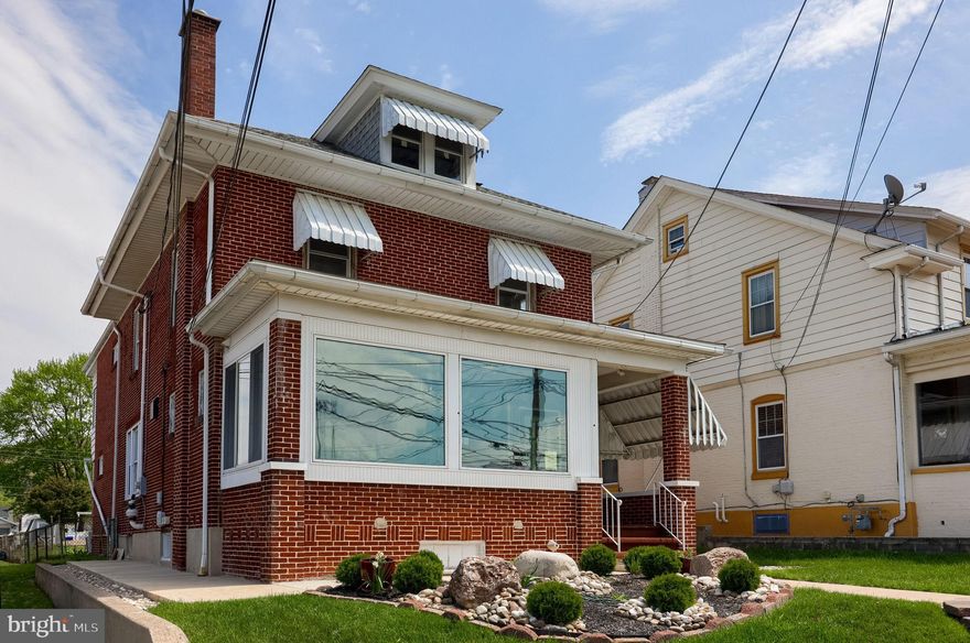 Completely renovated and updated commercial building in high visibility location in Muhlenberg.  This building has large retail and office space on the first floor, along with a large kitchen.  There is an enclosed front porch that functions well as a display window.  Upstairs are 4 bedrooms and two full bathrooms.  
The lower level is finished off with two additional rooms and a third full bathroom.  The property also includes a two car detached garage in the rear.