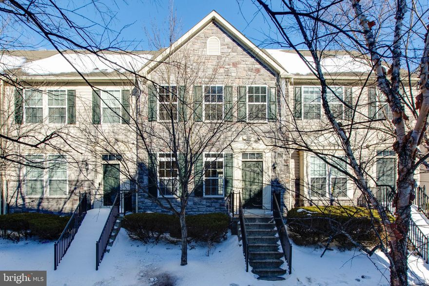 Beautifully upgraded townhome located in the desirable Belmont Station community. This home features extensive upgrades, including hardwired connections in every room and an in-ceiling surround sound system. The bright, open floor plan is accented by rich gunstock hardwood floors and a spacious kitchen with cherry cabinets, granite countertops, stainless steel appliances, a large island, and an expansive pantry—perfect for both everyday living and entertaining. The primary suite includes a luxurious bathroom with a Roman-style shower and dual shower heads. Enjoy relaxing outdoor views from your private deck. Additional highlights include a one-year-old washer and a newly installed energy-efficient water heater. Residents enjoy resort-style community amenities such as a walking trail around the pond, playground, in-ground swimming pool, cabana, arcade, game room, community center, fitness facility, and business office. Ideally situated with quick access to I-95, I-100, and I-295 for easy commuting.