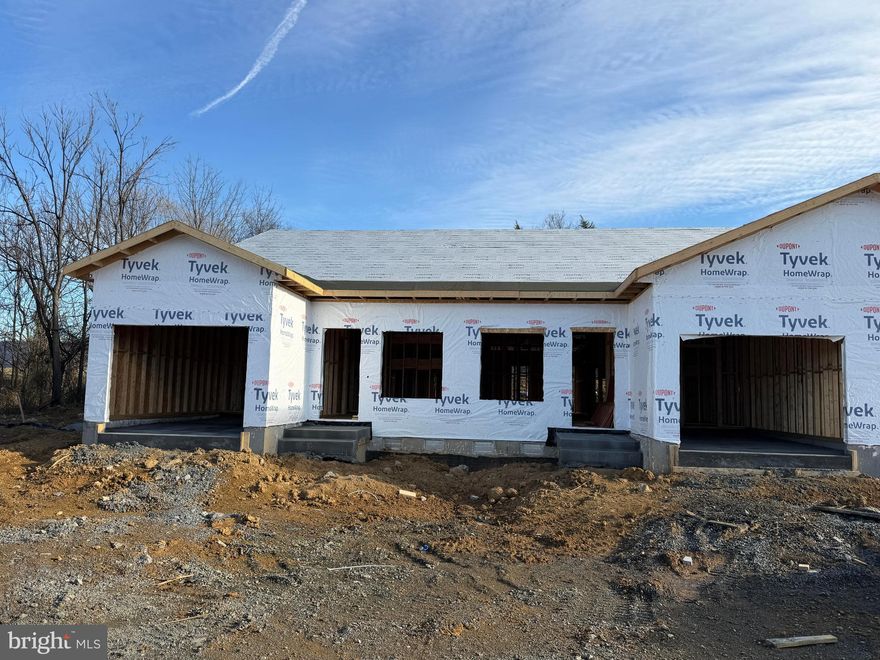 New construction quadplex unit in desirable Woodstock, VA, just a short drive from Seven Bends State Park’s outdoor recreation along the North Fork of the Shenandoah River, including hiking, picnicking, fishing and scenic views. This unit features 2 bedrooms, 2 full baths, a versatile den, and an attached one-car garage. The well-planned layout offers low-maintenance living with modern finishes, an open living space, and generously sized bedrooms, and the den provides flexible use as a home office or additional living area. Ideal for those seeking new construction near both town amenities and world-class outdoor access. Real estate taxes currently shown do not reflect a home built on the property.