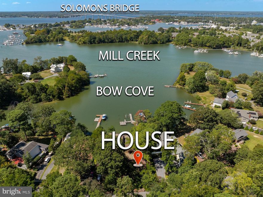 Waterfront luxury at its finest! Nestled in exclusive Bow Cove—renowned as a safe “hurricane hole” for boaters—this stunning home offers captivating water views from the moment you enter. The elegant living and dining areas glow with natural light, complemented by a cozy fireplace perfect for entertaining. The inviting family room features a woodstove and sweeping water vistas. The owner’s suite provides a serene retreat with panoramic views, while upstairs offers two spacious en suites and an office. Outdoor living is exceptional with multiple decks, a screened porch ideal for dining, and beautifully designed hardscaping. A two-car garage completes this exceptional property. Just minutes by boat to Historic Solomons Island, the Patuxent River, and the Chesapeake Bay. Enjoy unforgettable sunsets and refined coastal living in this one-of-a-kind waterfront sanctuary!