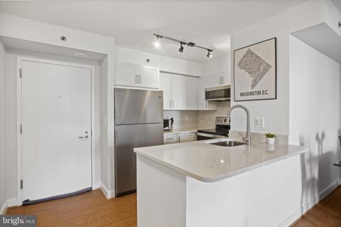 Photo of 7500 WOODMONT AVE #S616, BETHESDA, MD 20814 (MLS # MDMC2084986)