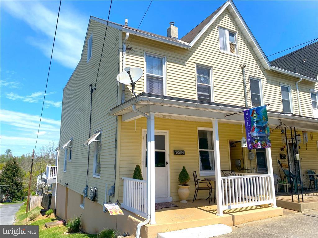 Discover this charming 4-bedroom semi-detached home in Wilson, blending city convenience with serene backyard tranquility. Located in the Wilson School District, this residence features a spacious kitchen with a large walk-in pantry, a full dining room, living room, and back porch on the main level. The second floor includes three bedrooms, a full bathroom, and ample closet space, while the third floor offers the fourth bedroom and additional storage with drawbridge access. The full basement boasts laundry facilities, walkout access, extra storage, a workshop area, and a Pittsburgh toilet and shower. Complete with a quiet backyard and parking pad, this affordable gem offers many of the desirable features found in higher-priced properties. Don’t miss this opportunity—contact your agent today!