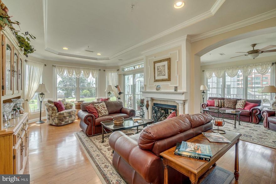 When your everyday life becomes like a vacation, you've arrived at Waters Edge! This stunning EOG condo is close to Route 40, I-95, APG, Amtrak & more.   Offering over 2000 sf while the serene, water views from every window never cease to amaze that life just got that much better.  Gleaming wood floors thruout, there are 2 bedrooms w/ 2 full baths.  Wake up every morning to the beautiful Bush River and relax in the custom glass/tiled shower or bath.  Two walk in closets w/ upgraded hanger system. Open floorplan of living/dining & kitchen.  Stunning custom moldings & neutral paint tones capture the grandeur of this condo. Spacious kitchen w/ Corian counters, ample storage w/ walk in pantry, custom back splash tile, instant hot water, coffered ceiling & modern,updated SS appliances w/ 4.5 yr warranty- Refrigerator w/ glass front & programmable ice size options! Living, formal DR & den w/ balcony access for outside living.  Double sided gas FP is just another upgrade to enjoy during cooler months ahead.  Bonus 2nd Family Room can be an optional 3rd BR w/ privacy pocket doors.  Bose surround system is wired thruout  providing music speakers to enjoy after a long day.   Updated Lennox HVAC, 55 gal water heater &power saver voltage regulator.   Desired in unit storage space plus private garage parking spot.  Community is gated with secured intercom system for entry.  Clubhouse offers seasonal pool space, putting green, walking trails, fitness center, kitchen available & meeting rooms for private parties or add'l relaxing space.   Local yacht club is minutes away if boat docking is needed.  Life is meant to be enjoyed, so start today in Water's Edge!  Please respect all COVID-19 rules in place while visiting this unit.