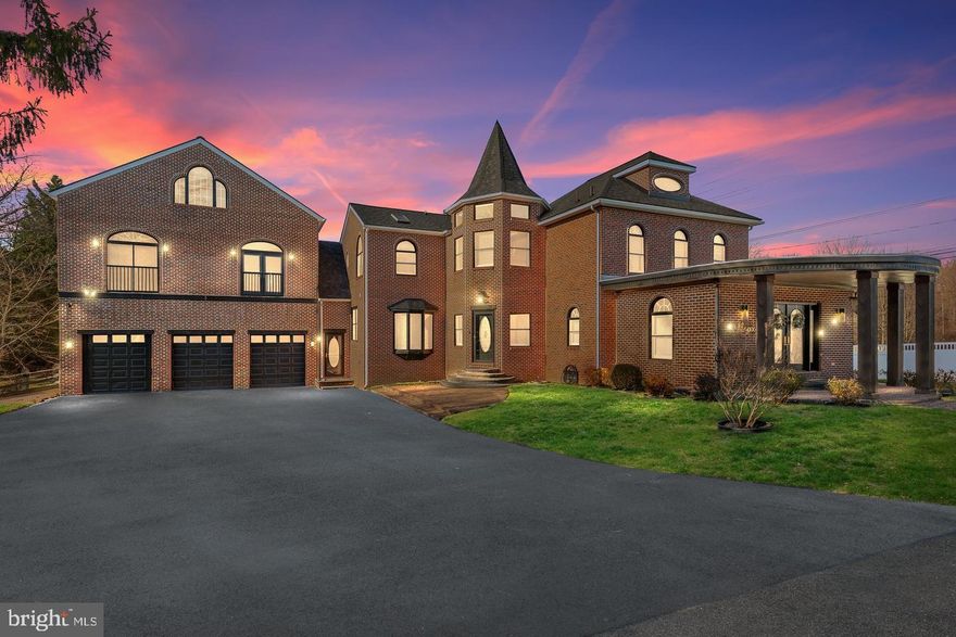 Welcome to 4100 Lancaster Pike — an extraordinary estate offering architectural presence, refined scale, and modern livability in one of the most desirable corridors just outside Wilmington, Delaware.

Positioned on nearly half an acre of enclosed grounds, this distinguished colonial spans over 5,300 square feet and delivers a rare combination of historic character and contemporary comfort. From its stately exterior to its thoughtfully updated interior, the home offers an elevated lifestyle designed for both grand entertaining and everyday ease.

Inside, dramatic ceiling heights and graceful archways immediately capture attention, while preserved architectural details add depth and authenticity throughout. A sculptural spiral staircase rises as a striking focal point, setting the tone for the home’s unique design pedigree. Multiple fireplaces create intimate gathering spaces across several formal and casual living areas, allowing the residence to feel both expansive and inviting.

The kitchen has been reimagined for today’s discerning buyer, blending style and function with quartz surfaces, custom cabinetry, and a sleek black stainless appliance suite. Designed to anchor the home, it flows seamlessly into generous dining and family spaces—ideal for hosting everything from elegant dinner parties to relaxed weekends at home. A light-filled sunroom offers an additional retreat, perfect for quiet mornings or evening unwinding.

Upstairs, spacious bedrooms provide comfort and flexibility. The primary suite is especially impressive, featuring soaring vaulted ceilings and a private sitting area that creates a true owner’s sanctuary. A separate in-law or au pair suite enhances the home’s versatility, making it well-suited for multi-generational living or long-term guests. Dedicated office spaces allow for productive work-from-home arrangements without sacrificing privacy.

Car enthusiasts and collectors will appreciate the oversized three-car garage with high ceilings and ample storage capacity — a rare amenity at this price point.

The location offers both prestige and convenience, just minutes from the boutiques and dining destinations of Greenville, as well as the charm of Centreville and Hockessin. With easy connectivity to the greater Baltimore–Philadelphia corridor, the property appeals to buyers seeking accessibility while enjoying Delaware’s favorable value proposition.

Competitively positioned relative to nearby luxury sales and offering settlement assistance to qualified purchasers, 4100 Lancaster Pike represents a compelling opportunity to own a residence defined by scale, distinction, and enduring character.

A home of this presence is not simply purchased — it is claimed.