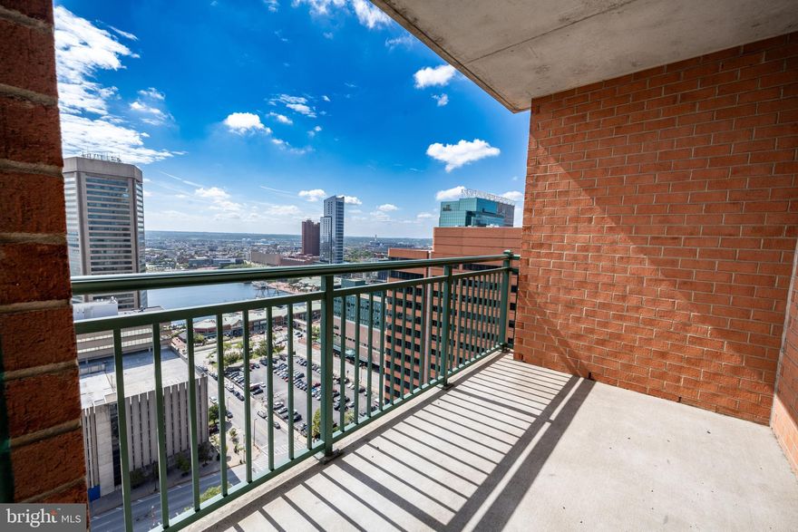 This is a must see Unit in 414 Water Street.  A centrally located, secure building close to everything.
This unit boasts a not to be missed panoramic view of Federal Hill, the Inner Harbor, Hard Rock, Power Plant, Aquarium and Stadiums and everything Baltimore has to offer at your doorstep.  This location is ideal for access to Johns Hopkins and University of Maryland Medical Campuses as well.

2 large bedrooms, both with en-suite full bathrooms.   Large living room and updated kitchen with stainless steel and gas appliances.   Stacked washer and dryer in unit and as a bonus, parking space is included in the garage.  Building amenities also include the outdoor pool, lounge and meeting area as well as a business center.