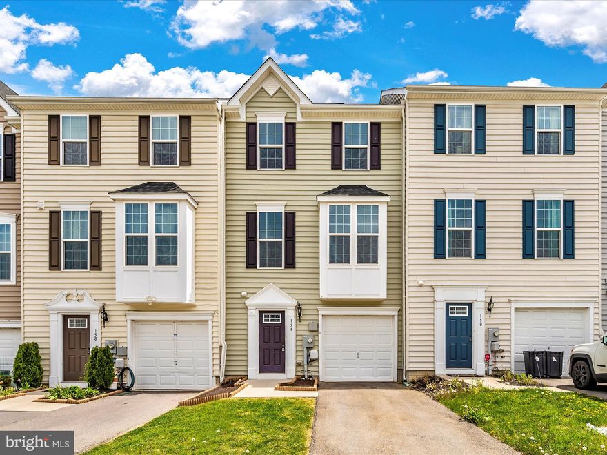 Welcome home to 154 Norwood Dr, located in beautiful Falling Waters, WV! This 3-level townhome has been freshly painted from top to bottom and the carpets freshly shampooed. Built in 2016, this home features 3 bedrooms, 2 full and 1 half bath. Boasting just shy of 2,000 square feet of finished living space, this home has all the space you could need. The entry level features access to your spacious garage, a powder room, and a large rec room equipped with hardwired surround sound. As you continue up to the main level you will be greeted by an open-concept kitchen featuring a large center island and peninsula, stainless steel appliances, vinyl flooring, a spacious pantry, and a dining area with a sliding glass door that leads you to your upper deck. Off of the kitchen, you are greeted by a cozy living room, perfect for entertaining all guests! As you make your way upstairs, you will find a large primary suite with a walk-in closet, and an en suite bathroom equipped with a dual vanity sink and walk-in shower. 2 additional bedrooms, a full bathroom, and a laundry room wrap up the upstairs. Conveniently located to I-81, doctor's offices, shopping, restaurants, and schools, all while maintaining peace and tranquility. This one won't last long so schedule your showing today and call this house your home!