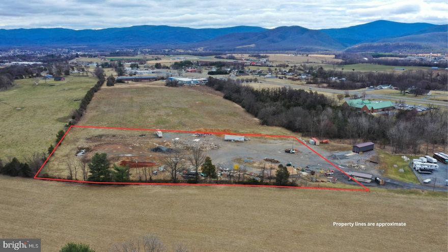 Opportunity awaits with this 5-acre level industrial parcel, perfectly positioned along the high-traffic corridor of Route 33 (Spotswood Trail) between McGaheysville and Elkton. Public water, sewer, and electric is available, with the site being ready for development. This location offers quick access to Harrisonburg, I-81, I-64, and Route 29, making it an ideal choice for a warehouse, manufacturing, flex space, or a contractor laydown yard. Just minutes from Coors and Merck, this property is a rare find for businesses seeking accessibility, and growth potential.