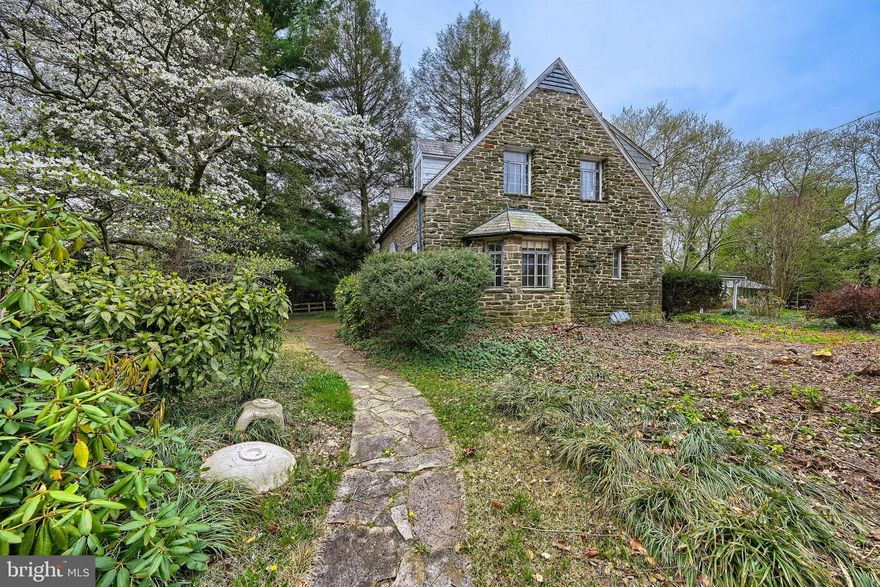 Developer opportunity.  6580 Loch Raven Blvd sits on approximately 1.5 acres in the Stoneleigh Elementary School district, with the possible opportunity to develop multiple homes on the lot.  
The main house also offers a unique chance to renovate a beautiful stone home.
The main residence features 3 bedrooms and 1.5 baths, along with an unfinished basement spanning the full footprint of the home. Original details include a slate roof and classic metal casement windows. A separate, permitted cottage provides 2 bedrooms, 1 bath, and approximately 500 square feet—ideal for guests, extended living, or additional flexibility.

Situated on approximately 1.5 acres, the property offers ample outdoor space and possible future opportunities.  Being sold As-Is . 

Seller believes the land may be suitable for development; buyers are encouraged to conduct their own due diligence regarding zoning and permitted uses.