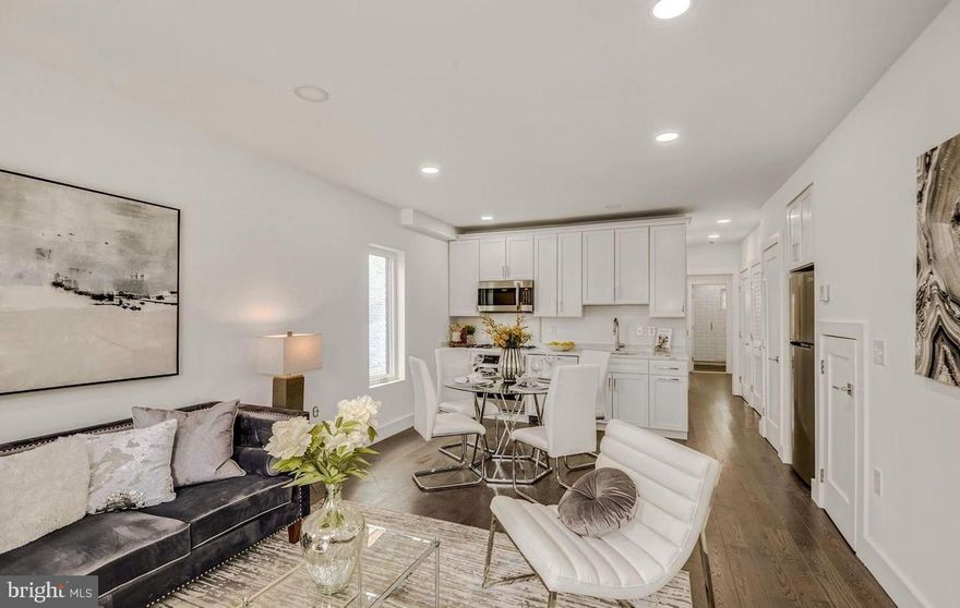 Move-in Ready! Welcome to this contemporary Columbia Heights 2BR/2BA condo is located on the ground floor of a converted end-of-row townhouse. Renovated from top to bottom just a few years ago, there is just one unit above you.  You will love the bright, open floor plan designed for today's lifestyles (843 sf.) .  A first-time rental, you'll love its clean lines and modern interiors, lofty ceilings, all-white kitchen/living space with luxury appliances, low-maintenance floors, stylish baths, fantastic closets, plentiful storage, in-unit, high-efficiency laundry, and digital entry locks....all in an uncompromisingly urban location close to the Georgia Avenue corridor, Howard University, U St and Shaw Metro stations (green line), Whole Foods, and more! Even better, enjoy your own private garden space w/bluestone patio and the convenience of off-street parking for one vehicle at the rear. You will control and be responsible for your own gas & electricity. A small dog or cat will be considered case-by-case and may require a pet rent. Professionally managed and ready for you. $50/adult application fee.