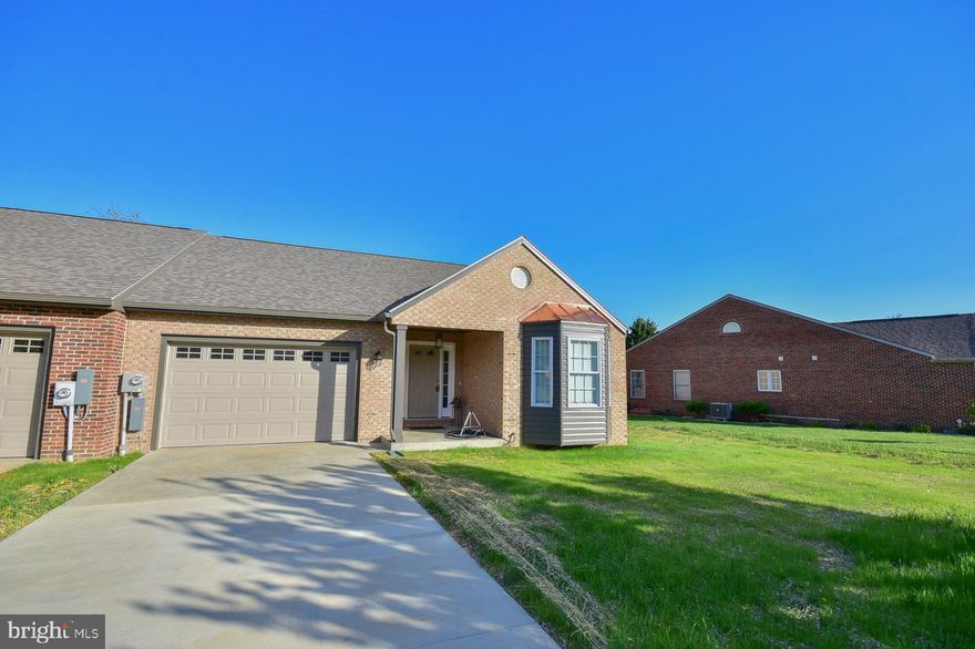 Nice Villa in sought after golf course community of Locust Hill. Walking distance to the Clubhouse. This home is all new from the ground up with luxury plank flooring and lots of upgrades throughout. . Featuring primary bedroom with walk-in closet, double sinks, shower, large linen closet and door that leads to a deck. The second spacious bedroom has a ceiling fan and is next to the hall bath with tub/shower. Huge family room with an open floorplan, vaulted ceilings and electric fireplace. Dining area off of the family room with vaulted ceilings. Country kitchen with granite countertops, double sinks, stainless steel appliances and a pantry.  Laundry area with stackable washer and dryer. Extra large one car garage and storage area off on the back deck.    Welcome to easy-living in this brand new beautifully styled home. Make an appointment to view today.