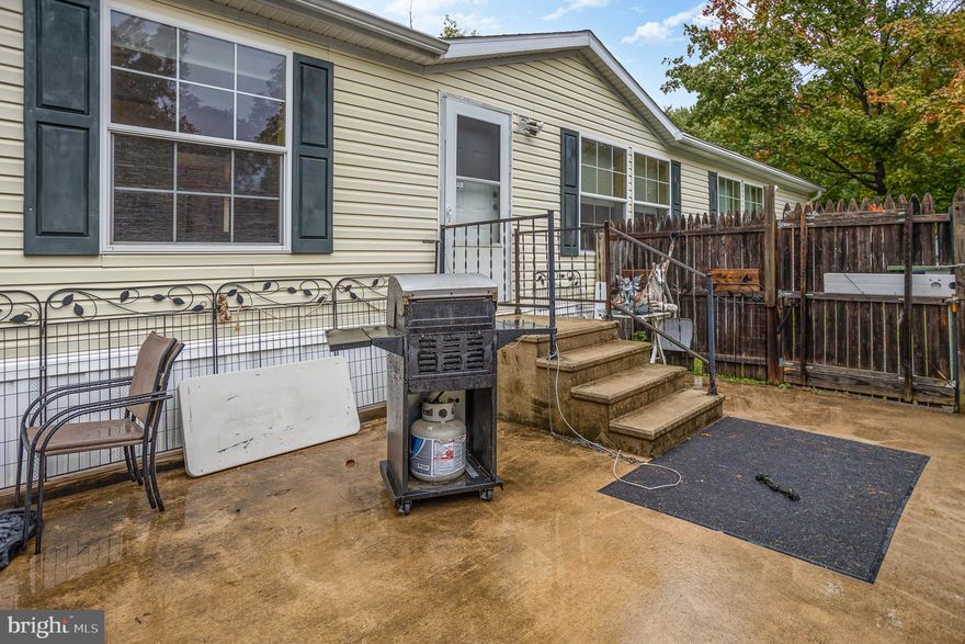 OFFER DEADLINE IS OCTOBER 7, 2022 AT MIDNIGHT. WE HAVE MUTLIPLE OFFERS SO PLEASE SUBMIT HIGHEST AND BEST OFFER. A POST SETTLEMENT OCCUPANCY WOULD ALSO BE A PLUS. 
NO GROUND RENT!!  NO HOA!! Spacious Double Wide Home located on cul de sac in small community. Home features 3 bedrooms, 2 full baths, dining area, large kitchen with island, office space, utility room, walk in closets, 2 car carport, shed, fenced yard & more.  Recent updates include  Central Air Condenser less then 2 years old, newer floors in living room, dining room & primary bedroom, leaf guards on gutters & newer washer & dryer. Handicap ramp for easy entry. Public Water & sewer. Schedule your showing today!!