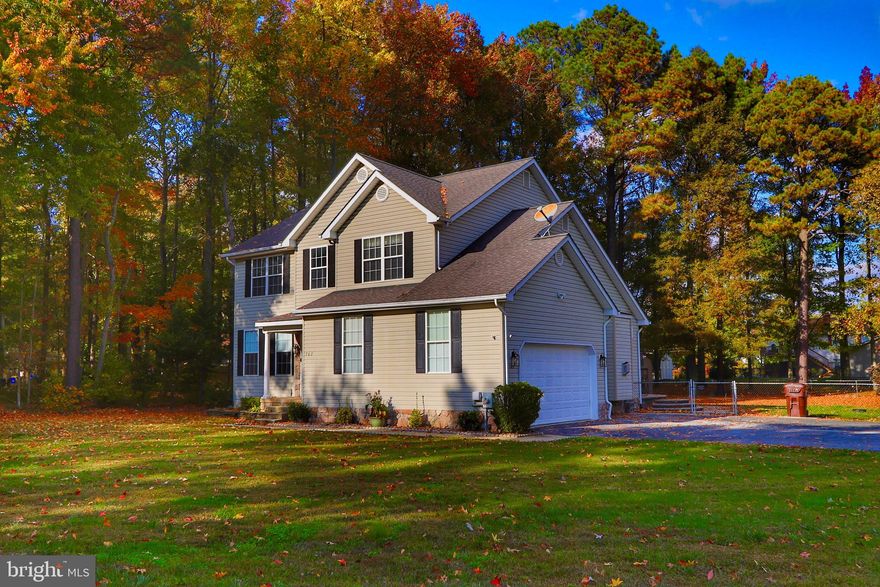 OPEN HOUSE Cancelled! We are under contract!

This is the ONE you have been waiting for. Super private, corner lot, the vacant lot next door, and built on an oversized lot, in sought-after Bay City. 
The entire first floor has been extensively renovated with over $100k of upgrades and renovations in the last 3 years, creating a space that seamlessly blends modern convenience with timeless charm. The attention to detail and the use of high-quality materials make it truly stand out. 
Make a grand entrance through the newly installed front door and storm door into the two-story foyer. The sitting room will greet you off of the foyer followed by the dining room featuring wainscot paneling. 
The heart of this home has been transformed into a chef's dream. The centerpiece of the kitchen is a spacious island, perfect for meal preparation and gatherings. You'll love the 36", farmhouse, oversized sink, and gas stove, which adds a touch of elegance to your culinary experience. The stunning quartz counters are not only beautiful but also highly durable.  The subway tile backsplash adds a touch of sophistication, and the upgraded hardware and lighting fixtures provide both style and functionality. You'll find this kitchen to be the perfect hub for your home. 
In the living room, you will find matching quartz on the gas fireplace surround with a custom fireplace mantle. This same quartz is featured in the first-floor half bath.  
Other first-floor upgrades include new craftsman-style interior doors. These doors not only add character but also complement the overall aesthetic of the home. Plantation shutters offer an element of privacy and add a touch of Southern charm. Crown molding graces the ceilings, giving each room an elegant and finished look. Birch hardwood floors throughout the home add warmth and charm, while also being easy to maintain. Enjoy the benefits of a tankless water heater, ensuring a constant supply of hot water while maximizing energy efficiency.
Upstairs you will find 4 spacious bedrooms and 2 full bathrooms. The primary bedroom features a walk-in closet and spacious shower. Lots of additional storage can be found in the two-car attached garage. 
Step outside, and you'll discover a true outdoor paradise with a half-acre lot that is partially fenced, bring the dog. The extensive paver patio provides ample space for outdoor gatherings, barbecues, and relaxation and it's complemented by a "SunSetter" awning. Plenty of room for a pool oasis in the backyard. 

Bay City is Kent Island's premier neighborhood. This home is located less than 5 minutes from the Bay Bridge. The community features a beach, boat ramp, waterfront pavilion, playground, and firepit to enjoy on the Chesapeake Bay. The community hosts numerous holiday events, including a spring sock burning party on the waterfront beach! How fun?!
BACK ON THE MARKET POST HOLIDAYS. READY TO SELL!