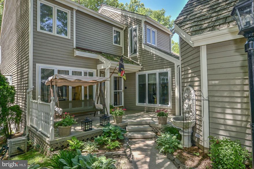 LIKE NEW! Incredible water front home in sought-after Montclair community. Boasting: New Paint & Carpet, hardwood floors, cozy wood burning fireplace; Chefs  Kitchen, Sep dining room; 2 master suites on upper level with 2 skylights; w/d on upper level; lower level features bedroom w/full bath; guest room; tons of storage; incredible deck w/ wlk to water/Dack. Fabulous vista!