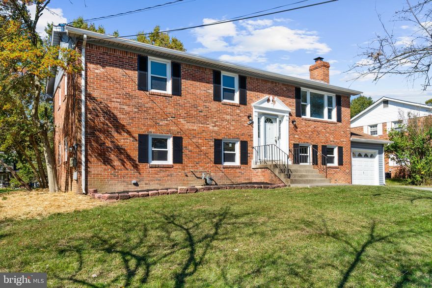 Absolutely stunning 5-bedroom, 3-bathroom split foyer in the heart of Temple Hills! This beautiful home boasts a range of modern amenities and tasteful updates, making it a true gem in the market. 
Step inside to discover a completely renovated kitchen, featuring gleaming quartz countertops and state-of-the-art stainless steel appliances. The kitchen is the heart of this home, and it's perfect for culinary enthusiasts and entertainers alike. 
The main level welcomes you with rich wood floors, creating a warm and inviting atmosphere. From the dining room, step out onto the deck, where you can enjoy al fresco dining or just unwind while taking in the view of your spacious backyard.
The expansive living room offers plenty of space for relaxation and social gatherings, making it an ideal spot for creating lasting memories with friends and family.
Head downstairs to the lower level, and you'll find wall-to-wall carpeting, making it a cozy space for movie nights, game days, or simply hanging out with loved ones. The family room features a charming fireplace, adding a touch of elegance and warmth to this area.
With a large driveway that leads to an attached garage, you'll have ample parking and storage space. This home is also conveniently situated with easy access to major roads, ensuring that your commute and daily travels are a breeze.
Don't miss out on this remarkable property! It's the perfect blend of comfort, convenience, and style. Schedule a viewing today and experience the luxurious lifestyle this Temple Hills split foyer has to offer.