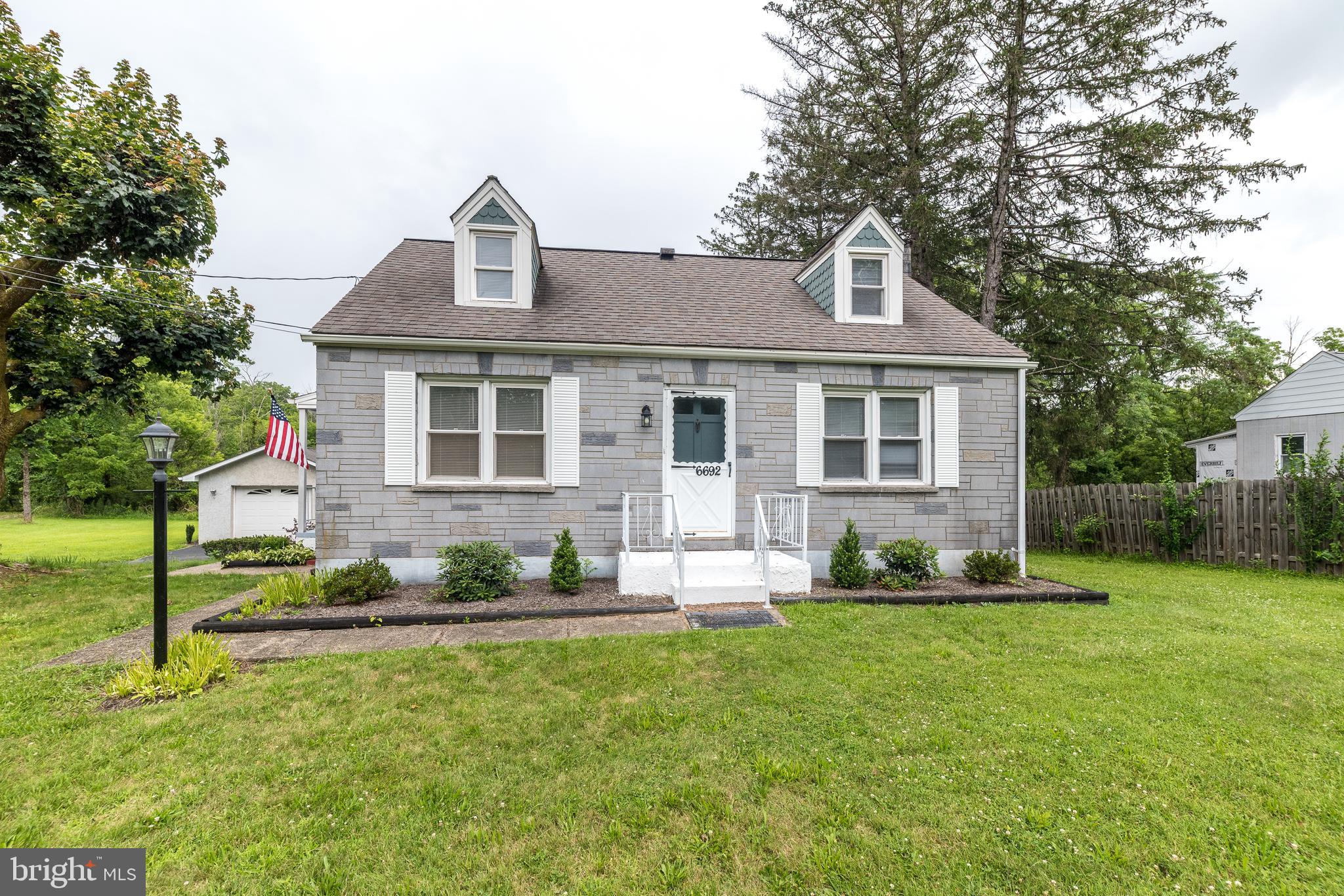 Charming Cape with large yard. Updated kitchen with white cabinets, electric range, dishwasher, refrigerator and granite counter. Side cover porch used as entrance. Living room with wood floors. Two bedrooms with carpet flooring and closets. A full bath completes this floor. Upper floor has plenty of storage, loft/open room/sitting area with powder room and bedroom. Full basement with outside exit, laundry including washer and dryer. The basement has been water proofed. Updates include New Kitchen includes new cabinets, new flooring, oil storage tank 2-17, newer well 2016. Replacement windows. Roof 10 years. Heater approx. 5 yrs.