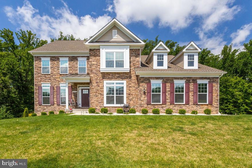 MNestled in the woodlands of Timberlake Manor, this model-like home boasts 5 bedrooms and 5 baths. Nestled in the woodlands of Thrift Manor, this model-like home boasts 5 bedrooms and 5 baths. Enter on the main level that features an open floor plan with separate living room, dining room, and spacious family room with 20 foot ceilings, gorgeous natural light, and gas fireplace.

The gourmet kitchen, with its oversized island, granite countertops, stainless steel appliances, abundance of cabinetry, motion-censored lighting beneath the cabinets, and large butler’s pantry, is sure to wow your guests. Off the eat-in kitchen, you’ll find a private balcony/deck. The main floor also hosts a powder room for guests and in-law suite, complete with full bathroom.

Upstairs you’ll find a massive primary suite with a seating area, two walk-in closets, and luxury on-suite bathroom. The immaculate bathroom greets you with a soaking tub, large walk-in dual head shower, water closet and linen closet. You’ll also find two additional bedrooms connected by a Jack and Jill bathroom, hall closet, and laundry room with deep utility sink.

The finished walkout basement includes a large bedroom, full bathroom, large family room with bar area, three additional closets, separate studio or movie room, and additional storage space. Exterior includes irrigation system, landscaped front, and wooded private backyard.

BONUS: Home wired for surround sound in living room, primary bedroom, primary bathroom, and basement. Basement refrigerator (original to home) to stay.