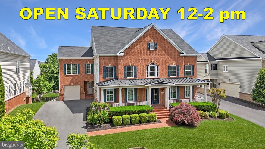 Effortless Luxury Living with Exceptional Space and Multi-Generational Design.
<br><br>
This stately all-brick colonial offers over 7,000 square feet of refined living on a lush ⅓-acre lot. Featuring six bedrooms and four-and-a-half baths, the home is exceptionally well suited for multi-generational living, with private guest or in-law suites on both the upper and lower levels and a high-capacity residential elevator providing convenient access to all floors.
<br><br>
Gracious interiors showcase newly hand-finished hardwood floors, custom moldings, and an easy, flowing layout ideal for everyday living and entertaining. The formal living and dining rooms offer elegant, well-defined spaces perfect for holidays and special gatherings, with a tray ceiling adding architectural interest to the dining room. The sunlit family room centers around a cozy gas fireplace, while a private main-level office provides a quiet work-from-home retreat.
<br><br>
The chef’s kitchen is a true showpiece, designed for both everyday living and effortless entertaining. Quartz countertops, shaker-style cabinetry, and a timeless subway tile backsplash frame a massive center island with generous seating, making it the natural gathering place of the home. High-end KitchenAid stainless steel appliances—including a gas cooktop and double wall oven—deliver exceptional performance, while designer pendant lighting adds warmth, depth, and a refined finishing touch.
<br><br>
The luxurious primary suite is a true sanctuary, offering a private balcony, tray ceiling, hardwood floors, step-down sitting room, expansive walk-in closet, wet bar, and a spa-inspired bathroom with soaking tub and walk-in shower.  Secondary bedrooms are generously sized and thoughtfully arranged, including a Jack-and-Jill layout. A second upper-level office and spacious laundry room complete the upper floor, all easily accessible via elevator.
<br><br>
The daylight walk-out basement expands the living space with LVP flooring, a second gas fireplace, a custom home theatre, a full bath, and a sixth bedroom—ideal for extended family or guests.  Ample storage includes a large room with built-in shelving.
<br><br>
Outdoor living features an expansive deck with stairs to a fully fenced and landscaped backyard. An oversized three-car garage with a separate entrance adds everyday convenience.
<br><br>
The home has benefited from over $50,000 in recent renovations, including all hardwood floors newly hand-finished and newly remodeled bathrooms in both the upper- and lower-level guest suites.  Additional improvements include a high-capacity residential elevator serving all levels, a whole-house generator for uninterrupted comfort, and a zoned fire suppression system that has been recently inspected and is in excellent working condition.
<br><br>
Located in the highly desirable Brambleton community, residents enjoy five pools, over 18 miles of trails, parks, sports courts, and year-round events. HOA includes Verizon FiOS internet and TV. Close to the Silver Line Metro, major commuter routes, and Brambleton Town Center’s shopping, dining, and entertainment—offering the perfect blend of luxury, comfort, and long-term flexibility.