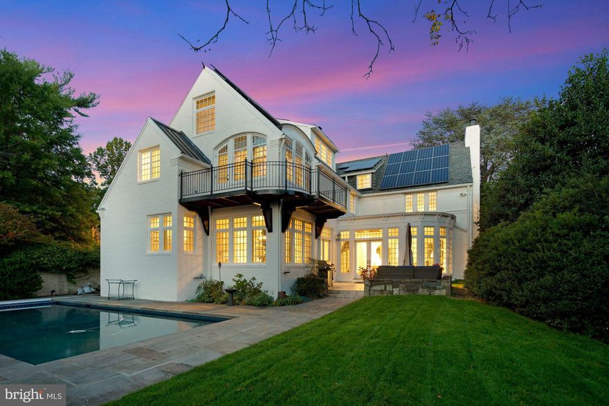 One of the most legendary streets in Washington, D.C.  home to a number of well known high level administration executives and even one of our Presidents.

Welcome to this incomparable residence expanded and renovated originally by a well known builder/owner. 
Designer landscaping enhances the gardens, flagstone terraces and swimming pool. Custom details abound from high ceilings to the Kolbe and Kolbe windows,  five piece coved moldings and oversized baseboards. Custom lighting throughout along with elegant built ins and speaker systems make this residence a dream for entertaining and todays living.   All major rooms are artfully designed to lead from the elongated  entry hallway.   At the front of the home the double living room  with fireplace provides for multiple seating areas. The sunroom with atrium windows flows from the living room and leads to the tiered flagstone patio and pool.  A gourmet kitchen with island and cabinetry along all walls is a cooks delight.   The separate breakfast room with sunny windows overlooks the garden, patio and pool area.  Entertaining is seamless with the butlers pantry leading to the dining room.   To complete the main level, a home office and powder room are conveniently located off the main foyer.   The artful reverse staircase leads to the second level primary owners suite......a wonderful surprise with an open and spacious bedroom, balcony overlooking pool and small staircase up to a den/library with fireplace.  The moldings throughout are reminiscent of the
best of woodworking and carpentry found in five star hotels.  Along with ample walk in closets, the primary suite offers a his and her bath. Continuing on the second level, bedrooms two and three have access to two additional baths on this level.  The third floor offers a spacious bright office/playroom/studio and a separate bedroom and bathroom number 5.  The lower level is complete with a recreation room, playroom, bedroom number 5 and bath number 6, gym, two utility rooms, an art room with built ins galore, and a full laundry room with full bathroom number 7.   There is ample space on the lower level to create the wine cellar of your dreams.   A full two car garage is found on the garden level of the home.  

This residence is special.......an original builders top quality and high end finishes, woodworking found only in custom homes, and designer lighting and sound throughout.   Your new home awaits in lovely sought after Forest Hills.   30th Place is a special street between Garrison and Ellicott, tucked away as if its own retreat within the city.