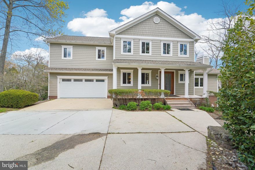 Welcome to a boater's enthusiast dream with 4,100 sq ft of living space. This 3 level home , located on a point, has expansive Brazilian wood decking on all levels overlooking the water. Relax in your hot tub after boating, while entertaining in the bar area complete with fridge, built-ins and flat screen TV. The pier has water and electricity at site with a 10,000 lb boat lift and jet ski lift. This meticulously maintained and updated home has a contemporary floor plan and lends to entertaining. The main level hosts a step down great room with gas fireplace, vaulted ceiling, skylights, decorative ceiling fan with expansive views of the water. The gourmet kitchen with a sizeable island, double ovens, gas cooktop, stainless steel upgraded appliances and eat in area overlooks the water off the oversized deck. A large dining room and powder room off the foyer completes the main living level with entrance to the two car garage. From the second level off the spacious primary bedroom enjoy mornings on your private deck. The primary bath with enlarged shower, double bowl sinks with granite top, leads into the separate dressing area with customized shelving. Ceiling fans grace all bedrooms. One of the bedrooms has built -ins ideal for an office or craft room. The separate laundry room with washer, dryer, cabinets and sink completes the second level. Lastly the lower level can be an in-law/au Pair/suite or an extensive entertainment area. The open floor plan hosts a sperate bar area, entertainment/game room, bedroom or family room,  third full bath, and a utility room with washer/dryer, sink, refrigerator, cabinets and wine rack which can be converted into a kitchenette. Relax on the panoramic lower level deck complete with swing and easy access to the pier. 
The following items have been replaced/repaired: roof, Hardie Board siding, windows and garage door 2018, gas furnace  2016, air conditioning unit 2015, tankless hot water heater 2023, Brazilian decking 2012, boat and jet ski lift 2010,  hot tub 2024, carpeting 2024, hardwood floors refinished 2024, refrigerator in kitchen 2012, refrigerator in lower level 2015, microwave 2013, dishwasher 2018, washer/dryer in upper area 2022, washer/dryer in lower area 2016.
Stewarts Landing is a family oriented neighborhood hosting Easter Eggs Hunts, Halloween parades, Fall Festivals, among just a few events. The community amenities include a community marina, living shoreline for kayaks and water boards, basketball court, 2 tot lots and dog park