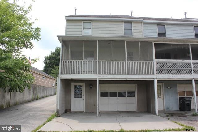 1/2 duplex townhome offers screened porch and 1st floor laundry. Large rooms through out and rear entry garage. Shared driveway-access with neighbor. Seller selling home in as-is condition, however, condition is overall avg/good.