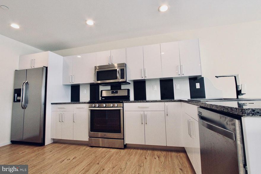 Looking for the suburban experience right in the city? Look no further! Welcome to this stunning modern construction located in the rapidly growing area of West Philadelphia. This modern home features five spacious bedrooms, each with ample closet space, including a walk-in closet in the master bedroom. Enjoy hardwood flooring throughout, stainless steel appliances, porcelain countertops, in-unit washer and dryer, a dishwasher, and large windows that flood the space with natural light. The bathroom is custom-designed with luxurious, hotel-style finishes for a high-end feel.

This is a fantastic opportunity for students looking to share or young professionals seeking a spacious, modern home in the city.  Perfect for large families as well. The unit comes with a one-car garage, a green roof deck  and offers convenient access to a shuttle bus to and from Drexel University and UPenn. Plus, it’s ideally situated near public transportation, highways, and bus lines.

With only two months' rent required upfront, this is a must-see! Available now!