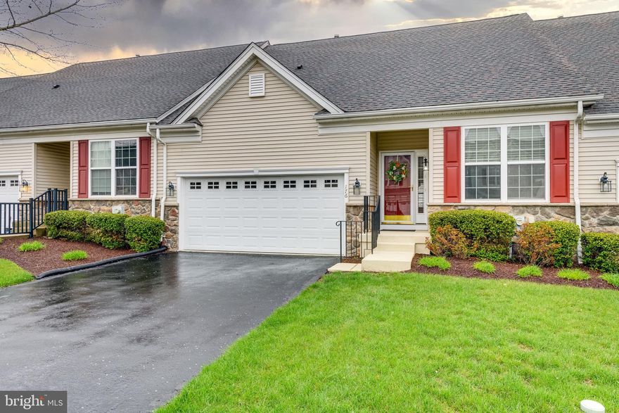 Meticulously Maintained Townhome in the Villages at Hillview – 55+ Living at Its Best!  Welcome to easy living in the sought-after Villages at Hillview, a vibrant 55+ community offering resort-style amenities and a strong sense of community. This 2-bedroom, 3-full-bath townhome features 2,003 finished square feet of beautifully maintained living space and a two-car garage.

Step inside to gleaming hardwood floors, and enjoy the open-concept kitchen and living room—perfect for everyday living and entertaining. The eat-in kitchen offers maple cabinetry, tile backsplash, island, large pantry, and direct access to a composite deck that overlooks the peaceful common area. The cozy family room features a gas fireplace, adding warmth and charm.

The dining room with wainscoting is ideal for hosting family and friends. The spacious front bedroom creates a private guest suite with a full bath featuring tile flooring. The primary suite includes his and her closets, a large en suite bath with tile flooring, and double sinks.

A finished walk-out lower level offers even more flexible space, including a large living area, full bath, generous storage, and the potential for a third bedroom. With double windows and a sliding glass door, this level is filled with natural light.  New Roof August 2022, Water Heater Fall 2022, Hardwood Floors added Fall 2022

At Hillview, your days can be as active or relaxing as you choose. Amenities include a fully renovated fitness center, indoor and outdoor pools, community garden, pickleball and tennis courts, recreation center, craft rooms, sewing and quilting building, library, basketball courts, and a calendar full of clubs and social events.
Conveniently located close to shopping, dining, golf, and top medical facilities—with easy access to Philadelphia, Wilmington, and Harrisburg International Airports, and just 10 minutes to the Thorndale SEPTA station.  Pack your bags and start living the carefree lifestyle you deserve!