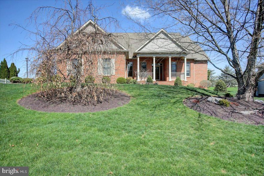 Welcome to 3167 Saint Andrews Drive in Scot Greene Estates. This Stately Home Boasts a Cathedral Great Room with a Gas Fireplace, a Columned Dining Room for Formal Gatherings, a Separate Living Room or Study, Hardwood Floors, Grand Ceilings, 4 Bedrooms, 4.5 Bathrooms and a Walk Out Basement. The Kitchen includes Granite Counters, Stainless Steel Appliances, plus a Breakfast Area with Beautiful Views of the Countryside and Glimpses of the Mountains.  The Spacious Primary Suite provides a Sitting Area with Natural Light, Tray Ceilings, Walk in Closet, Tile Shower, Jetted Soaking Tub, Dual Vanities and a Separate Toilet Room.  Also, on the Main Level there is a Laundry Room and a Guest Half Bath, as well as 2 More Bedrooms Sharing a Private Full Bath.  Upstairs you will find a 4th Bedroom Suite with a Full Bath and Walk in Closet.  The Lower Level is Walk Out with Plenty of Space to Entertain. A Kitchenette Sitting Area and Full Bath allows for ease in Hosting Overnight Guests. There is both a Family Room and a Recreation Room.  Additional Spaces Include Hobby Room, 2 Storage Rooms, Utility Area, and Workshop Area. Lower Levels Open to a Patio and Fenced in Yard with Lovely Professional Landscaping.  Scot Greene Estates is Close to I81, Rt 30 and Rt 11 for Commuters.