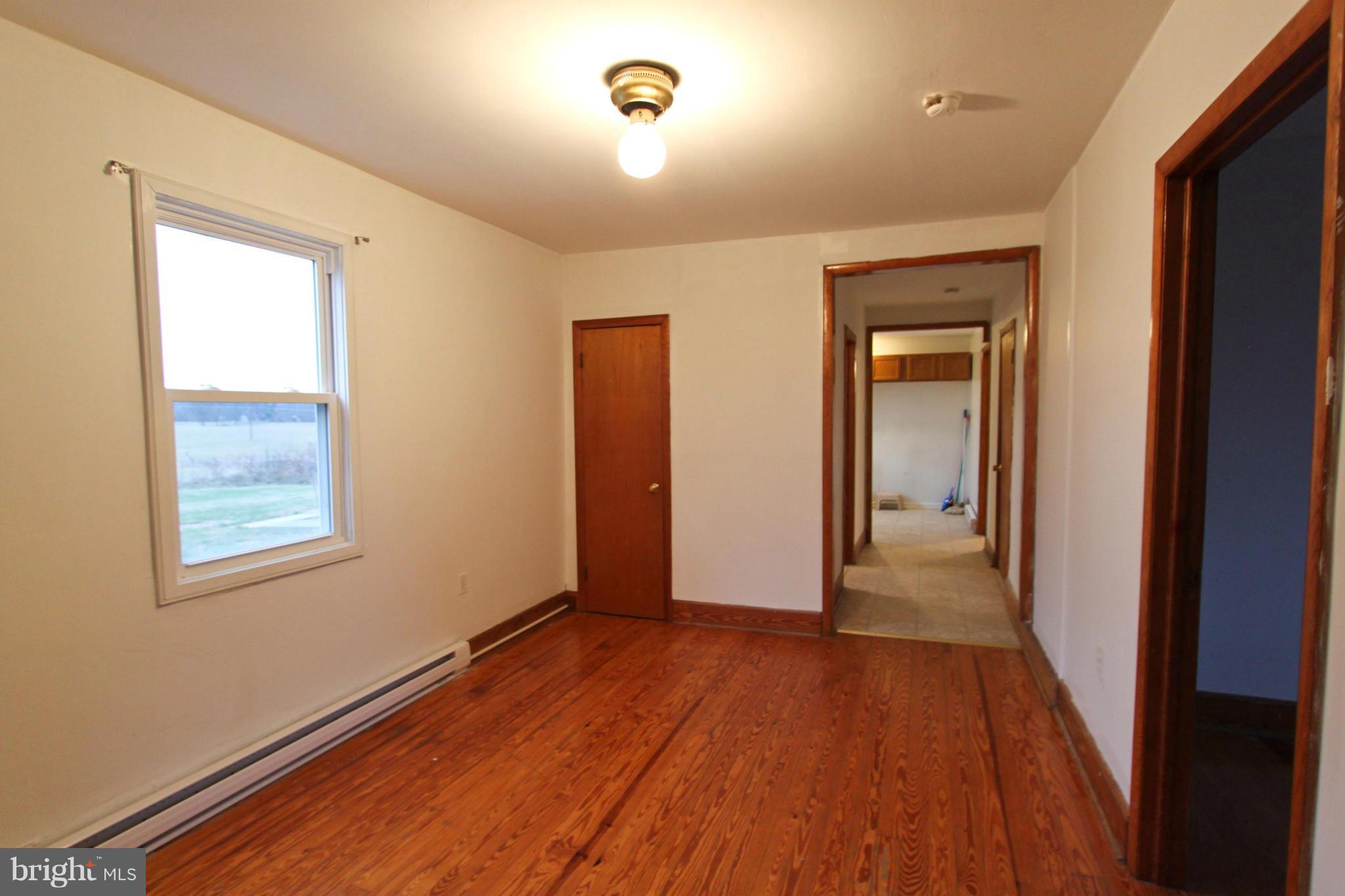 This apartment features hardwood floors with new paint and updates throughout. The living and dining room are large with plenty of light from windows offering views of historic Rippon. The master bedroom has two closets and easy access to the front door. The second bedroom, while slightly smaller, offers ample closet space as well. This charming apartment is located right off of Rte 340, 10 minute