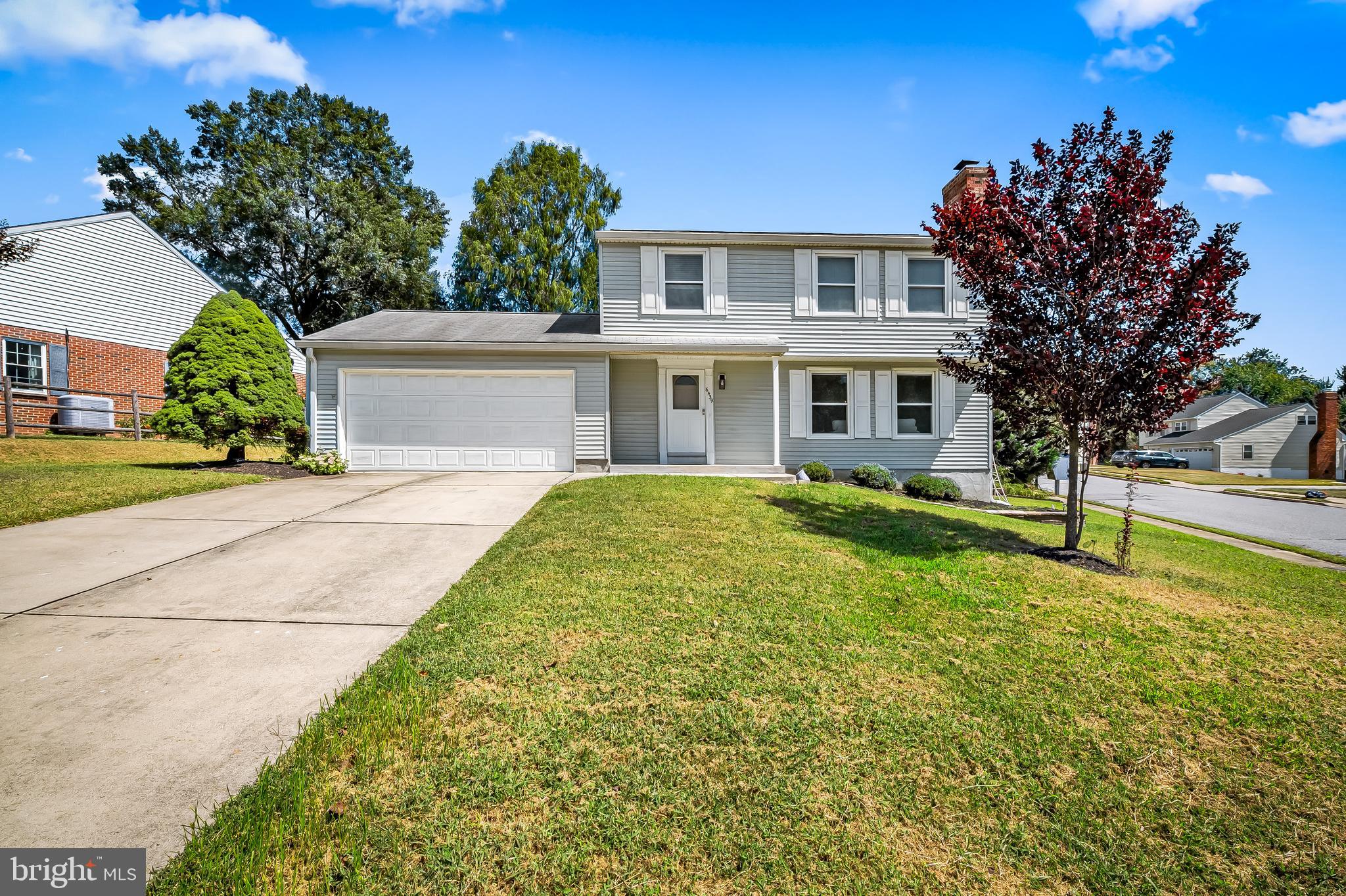 Lovely colonial on corner lot with fenced in yard and all 4 bedrooms located on the second floor. Main level features gleaming wood floors in every room. Spacious and versatile spaces include large, separate dining room for the holiday gatherings you'll want to host. Sunwashed living room/family room with brick clad, wood burning FP and attractive mantel- a cozy space you'll use year round. Kitchen is well designed for easy food prep and features 2 year old refrigerator/icemaker, oven/stove and dishwasher.
The sliding door off breakfast room leads to an enormous enclosed 3 season sunroom lined with windows and can perform multiple functions for playing, crafting, exercising.... You are limited only by your imagination. This room opens to your fully fenced, pet friendly, level backyard where bbqs and activities will be front and center. On second floor, primary bedroom features wall of closets and ensuite bath. 3 additional bedrooms and newer carpet in all rooms. Hall bath has tub/shower.
The basement level has separate laundry room and a semi-finished room. Due to a clogged condensate line that overflowed. Repairs were recently made and the carpet was removed to prevent mold growth. It would be easy to make this space useable again.
Let's not forget the attached 2 car garage. No more getting wet in the rain or cleaning the snow off of the cars. This house checks all the boxes!