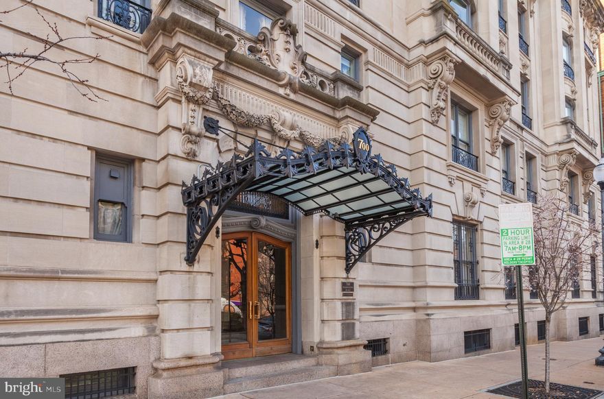 You can live and work anywhere.  Why not be in the center of Baltimore's Cultural District with a spectacular turn-of-the-century park as your front yard?
NOTE:  ALL TAXES, WATER, HEAT, TRASH SERVICE AND 24-HOUR DOOR ATTENDANTS ARE INCLUDED IN THE COOP FEE!!!!
This tastefully appointed apartment features 9' ceilings, elegant moldings, floor to ceiling windows, original inlaid hardwood flooring, and a decorative marble fireplace.  Crystal chandeliers, custom window treatments and a combined washer/dryer convey.   The updated kitchen has a breakfast bar, granite countertops, and custom buttercream cabinets.  Full bathroom is beautiful with exquisite new wallpaper.  Original French doors and brass hardware throughout.  Built-in flat screen television in family room.  Dining room and living room have picture perfect views of the Mount Vernon Place parks complete with fountains, marble balustrades, delightful entertainment programming, and special events.  Morning and afternoon sun provide wonderful light in every room.  The building features mahogany paneled elevators for residents and guests and this unit has two private storage areas on a lower level.  The Mount Vernon community features award-winning architecture and restaurants, the Baltimore Symphony Orchestra, The Peabody Conservatory, the Lyric Opera, the Maryland Center for History and Culture, The Walters Art Museum, Center Stage, and the spectacular Enoch Pratt Library.  Easy access to the grocery store, gyms, yoga studios, and lovely shops.  A free shuttle bus stops just outside the front doors, ride sharing and grocery delivery are fast and convenient, and the newly restored Penn Station is just a few blocks away.  Unlimited street parking for residents.  Located in the city's first and largest historic district, this fully renovated, 1906 apartment has the look and feel of a grand European residence.