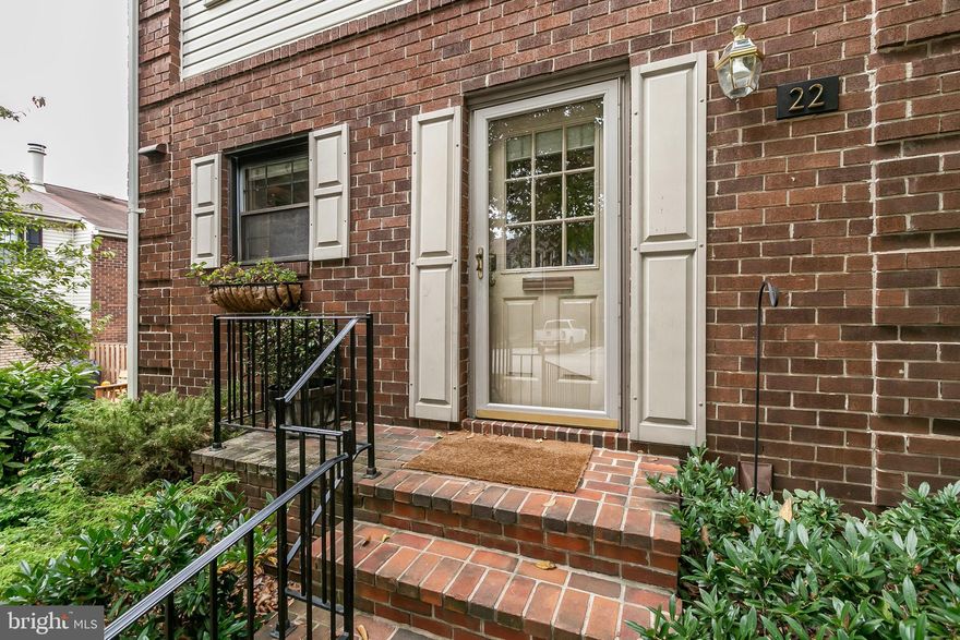 Spacious end of group townhome in gated community. This beautiful home is perfectly positioned in the middle of the neighborhood and backs up to a large open green space. The first floor has an open living/dining rooms, separate kitchen and powder room.  This is one of the rare homes with 2 large master suites on the 2nd floor, each with it's own full bathroom and good closet space.  The finished lower level has a wood burning fireplace, powder room and sliding glass doors that walkout to the rear patio and the open green space.  The neighborhood has a community pool and tennis courts!