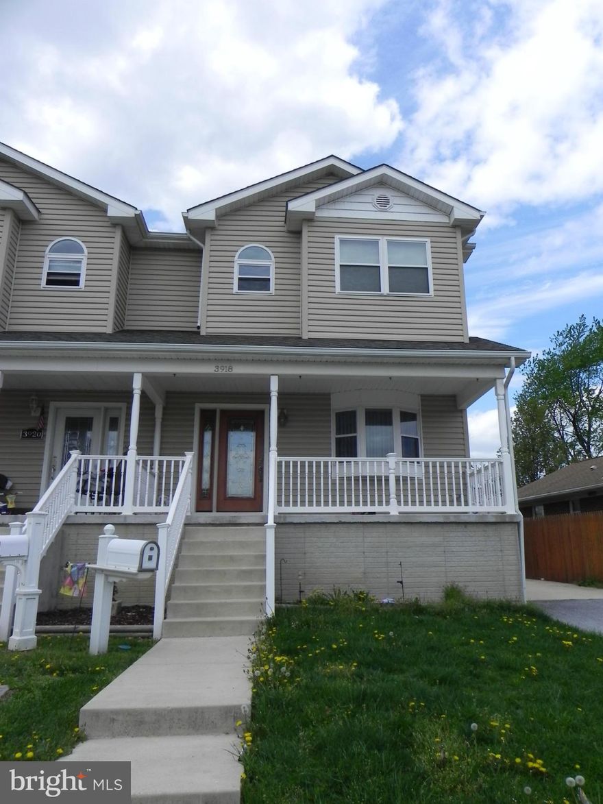 The wonderful 7 year old custom built house is just waiting for some one  to call home. This 3 bedroom 21/2 bath semi-attached townhouse features a kitchen with stainless steel appliances and large island. The finished lower level offers a kitchen, full bath and family room. The fenced in back yard with above ground pool which is offered as-is. Hardwood floors on main level. Ready for move in!