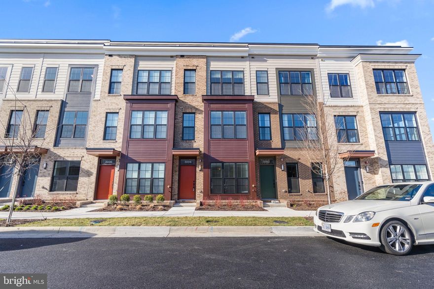 Welcome to your dream home at Graham Park in Falls Church, Virginia! This stunning newly constructed townhome by EYA offers 3 bedrooms and 3.5 bathrooms spanning over 2,000 sq ft of living space.  No detail was overlooked during the construction of this home.  The gourmet kitchen features a sophisticated contemporary design with quartz countertops, a waterfall kitchen island, stainless steel appliances including a gas range, and a modern tiled backsplash. Three spacious bedrooms feature large windows and ample closet space. Spa-inspired baths stun with large vanities, quartz countertops, and European-style large-format tile. Warm, wide-plank hardwood flooring flows throughout the home.  Additionally, the owner opted for multiple outdoor spaces and the third-floor loft with a rooftop deck, creating an indoor/outdoor living space. Park with ease in the secure two-car tandem garage with an electric charging station. 

The prime location of this residence is a commuter's delight, offering convenient access to major transportation arteries, including I-495 and I-66. Residents will find themselves strategically positioned near the Mosaic District and Tysons Corner, two bustling hubs for shopping, dining, and entertainment. Whether you're seeking a quiet retreat or an active lifestyle, this rental at Graham Park strikes the perfect balance, ensuring a harmonious blend of comfort, style, and accessibility.