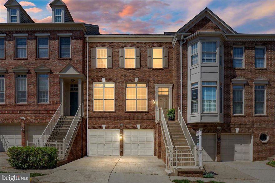 **Welcome to 9602 Lagersfield Circle — a beautifully maintained, light-filled 4-level townhouse ideally located just over a mile from the Vienna/Fairfax-GMU Metro, backing to a private wooded setting and featuring a fully fenced rear yard with gate.**

This home offers the perfect balance of space, functionality, and thoughtful updates throughout. The main level features hardwood flooring, an open-concept layout, and elegant crown molding and chair rail detailing. The **fully renovated kitchen** is a standout, featuring all new cabinetry, appliances, lighting, and finishes, along with abundant storage and a seamless connection to the breakfast area and family room with gas fireplace. From here, step out to the rear Trex deck (2023) with awning overlooking peaceful wooded views—ideal for everyday living and entertaining.

Upstairs, the spacious primary suite includes generous closet space and a well-appointed bath with separate shower and soaking tub, enhanced by a 2025 renovation including updated vanity, tile, fixtures, lighting, and fan. A secondary bedroom with en-suite bath and convenient upper-level laundry complete this level.

The top floor provides a private retreat with a large bedroom, walk-in closet, and full bath—perfect for guests, office, or flexible living.

The walk-out lower level features a recreation room, full bath, excellent storage, and direct access to the 2-car garage, along with entry to the fully fenced rear yard and private grassy area maintained by the HOA—all set against a wooded backdrop.

Extensive updates and maintenance include: roof replaced in 2013 with repair in 2018, fireplace replaced in 2018, exterior improvements including gutters, railings, and driveway (2022), Trex decking (2023), second-floor window replacements (2024), wood flooring refinished (2025), updated light fixtures throughout, and furnace replacement (2026). The home has also been consistently serviced, including A/C maintenance in 2024.

**The property has been continuously covered by an American Home Shield home warranty since ownership, with regular service calls and ongoing system care, reflecting a strong history of maintenance and attention to detail.**

With four finished levels, a full bathroom for each bedroom plus an additional lower-level bath, exceptional storage, and a rare combination of privacy, outdoor space, and commuter convenience, this home offers comfortable, low-maintenance living in one of Vienna’s most desirable locations.