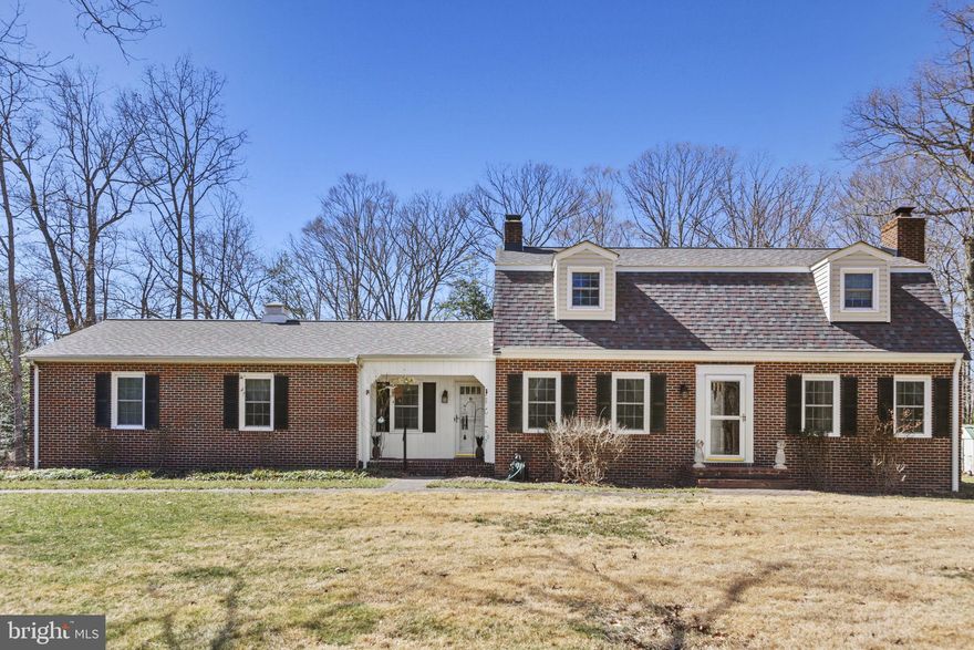 This beautiful home welcomes you with warmth and charm as you step through the front door. Hardwood floors flow throughout, complemented by a cozy fireplace and elegant details like fresh paint, crown molding, and chair rail accents.  The kitchen is a chef's dream with a farm sink, granite countertops, stainless steel appliances, and timeless custom tile work. A large, custom-built pantry with a coffee bar and an island offering tons of storage make it both functional and stylish. Adjacent to the kitchen is a versatile bonus room, ideal for a breakfast nook or sitting area, featuring a wood-burning fireplace. The spacious dining room is perfect for hosting with ample room for eight people. The home also offers a well-organized mudroom and laundry room, though the wood shelving units and baskets do not convey. In the basement, you'll find plenty of space for entertaining, or even a workbench, and tons of storage.
Upstairs, you’ll find three bedrooms and two full baths, all with hardwood floors. The master suite is a peaceful retreat, featuring a spacious bedroom, large walk-in closet, and a master bath with heated floors and double sinks.
For added versatility, the home includes an in-law apartment with its own entrance. The apartment features a living room, kitchen, bedroom with walk-in closet, and a bathroom, providing a perfect private space for guests or potential rental income

Outside, the spacious backyard is every homeowner's dream with two beautiful patios and a gazebo—ideal for cookouts, bonfires, gatherings and entertainment. Set on 1.89 acres, this corner lot offers plenty of room to roam and enjoy the outdoors.

This meticulously maintained home boasts numerous recent upgrades that offer both comfort and functionality. Situated on a beautifully landscaped lot, this property features:

Roof, Sump Pump, and Dehumidifier Replaced in 2024 for peace of mind and efficiency.
Freshly Painted Downstairs Level (2024), providing a modern and inviting atmosphere.
Upstairs Hardwood Floors Installed in 2023, adding warmth and elegance to the living spaces.
A/C Unit Replaced in 2021 for optimal climate control year-round. 
This home features a well-maintained septic system, last pumped in 2023.
A freshly repaved driveway completed in 2024, ensuring convenience and longevity for the new owners. Water Softener (2019), Kitchen Renovation (2019), and Master Bath Renovation (2020), offering a blend of style and practicality.

The exterior is equally impresimpressive, with:
10' x 14' Utility Shed perfect for storage or workspace.
5 Cords of Firewood to supply the two fireplaces, creating a cozy retreat for chilly nights.
Husqvarna Riding Mower with a cart, ideal for maintaining the yard or riding along the private walking trail through the wooded section of the property.
Additionally, monthly lawn care service is provided by MRW Lawn Service, ensuring your outdoor space stays pristine year-round.

This home is perfect for those who appreciate quality, convenience, and nature, all in one place. Don’t miss the opportunity to make this beautiful property your own!