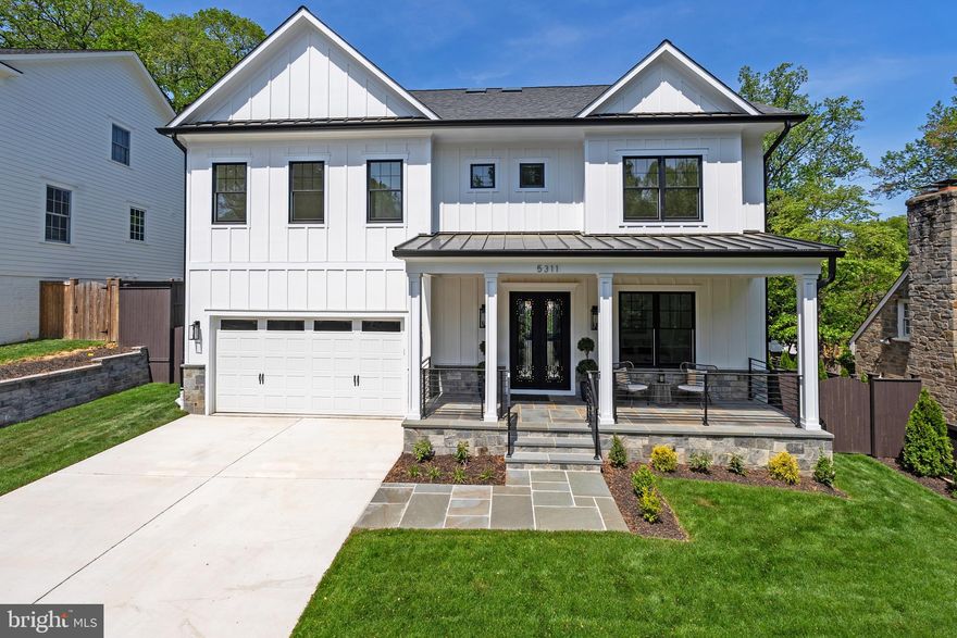 Welcome to 5311 Blackistone Road, an exquisite residence in the heart of Westmoreland Hills, where elegance meets modern sophistication. This newly constructed masterpiece, built in 2025 by a boutique builder who spares no expense, offers a spacious 5,900 square feet of luxurious living space, featuring 6 bedrooms and 6.5 bathrooms.

Step inside through custom 8 foot wrought iron doors to discover a home adorned with 6-inch white oak flooring and designer lighting throughout. The chef's kitchen is a culinary dream, equipped with Viking brand stainless steel appliances, designer hardware and custom cabinetry.  The main level boasts 10-foot ceilings and a seamless flow into the living areas, accentuated by a stunning linear gas fireplaces and intricate moldings including a coffered ceiling in the family room.

The generously wide staircase takes up to the second level with a primary suite and three additional bedrooms all with ensuite baths.  The primary suite is a sanctuary of comfort with a lighted tray ceiling, two walk-in closets, and an opulent ensuite bath featuring a soaking tub, separate shower, and Grohe fixtures. All closets are built-out with wooden rods and shelving. Each en-suite bath has its own unique character with carefully selected tiles and fixtures.
 
The third level boasts another gathering space, a full bath and bedroom, all flooded with natural light and views for miles.  Peer down the stairwell all the way to the main level – an elevator to access all floors can be easily installed if desired. 
 
The finished lower level is an entertainer's dream, boasting an almost 10 foot ceiling height, complete with a gym, second kitchen, wine room, bedroom, and full bath. Enjoy effortless indoor-outdoor living with a walk-out to the back patio, paved with elegant blue flagstones.

Completing this exceptional offering is a two-car garage with a fast EV charger, ensuring convenience and sustainability in one.

The fully fenced and professionally landscaped backyard is ideal for garden parties. Entertain with ease with the flagstone patio just off the kitchen and family room. Close proximity to The Little Falls Trail, Capital Crescent Trail, Westmoreland Hills Park and the neighborhood meeting place; "The Little House”. This spectacular residence offers tranquil living while being close to Spring Valley, Friendship Heights and Westbard Square shopping districts, the Metro, downtown DC, and Bethesda.  Westbrook ES, Westland MS, and B-CC HS serve the neighborhood. Discover refined living at its finest, welcome home!