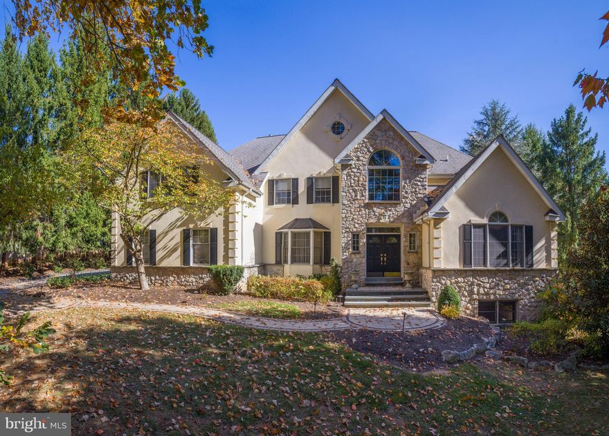 Welcome to 1260 Gulph Creek Drive, an exceptional luxury residence designed for elegant living and entertaining. Situated in a coveted neighborhood, this home offers unrivaled comfort both indoors and out, with finely crafted details and expansive, level, professionally landscaped grounds.

Step inside the grand, light-filled foyer, boasting 20-foot ceilings and hardwood flooring that extends throughout the home. To the left, the dining room features a bay window overlooking the lush front yard, while to the right, the vaulted-ceiling living room warmly welcomes guests. Adjacent to the living room is a home office, complete with French doors and custom built-in bookcases and cabinetry, perfect for remote work.

The main level flows into a spacious family room, bathed in natural light from skylights and featuring a fireplace and vaulted ceiling. The gourmet kitchen is appointed with a center island, granite countertops, a tile backsplash, and high-end stainless steel Viking appliances. A breakfast area with a coffee bar and pantry opens through French doors to the outdoor retreat, where a sun-soaked patio awaits.

The completely level backyard is a private oasis, complete with specimen trees, mature landscaping, flagstone walkways, deluxe pavers and Belgian block accents. This space is ideal for entertaining, featuring a built-in grill, outdoor granite countertops, refrigerator, dining area, a covered seating area with ceiling fan and three additional seating areas surrounding the in-ground pool and hot tub. For convenience, a powder room - one of two on the main level- is accessible from the pool area. Just off the kitchen, a well-appointed laundry/mudroom with a command center desk and built-in cabinetry leads to the attached 3-car garage.


Upstairs, the second floor features three generously sized bedrooms, each with abundant natural light, two of which share an updated hall bath with dual vanities. The third bedroom features a spacious and newly renovated en suite bath. At the end of the hall, the expansive primary suite offers a private retreat with a bonus office or seating area, his-and-hers closets, and a just completed fully renovated spa-inspired bath complete with a soaking tub, walk-in shower, dual sinks, and plenty of natural light. The top level boasts a fifth spacious bedroom with an en suite bath and sitting area with custom built-in bookcases, perfect for guests, a playroom, or a private retreat.

The stunning, fully finished lower level is designed for relaxation and recreation, offering a spacious den/playroom, billiards room, custom full bar, exercise room, climate-controlled wine cellar, and a high-end, state-of-the-art home theater. An additional half bath completes this floor.

This exceptional home seamlessly blends luxury and functionality, located in a prestigious community with convenient access to everything you need.