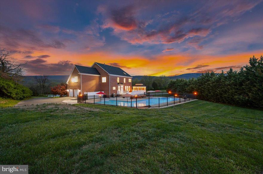 COMING SOON!  Pure grandeur, timeless elegance, and quiet country living come together in this exceptional estate, beautifully positioned on 3.32 acres along a peaceful court with no through traffic. Built with brick on all four sides and framed by mountain views from the front of the home, this property offers an impressive sense of arrival, privacy, and presence from the moment you arrive.

Inside, the grand two story foyer sets the tone with soaring space, natural light, and a refined sense of style. The main level blends formal elegance with comfortable everyday living, offering beautiful spaces for gathering, entertaining, and relaxing at home. Formal living and dining areas create the perfect setting for special occasions, while the oversized family room flows effortlessly into the beautifully updated gourmet kitchen. With granite countertops, stainless steel appliances, double wall ovens, generous cabinetry, and a center island with gas cooktop, the kitchen is both polished and practical, designed to keep everyone connected.

Outdoor living is one of the true highlights of this home. The massive deck offers incredible space for dining, lounging, and entertaining, while the expansive inground pool area creates the feel of a private resort right at home. From summer afternoons by the pool to quiet evenings in the screened gazebo, this outdoor setting was made to be enjoyed. Beyond the pool area, the fenced garden is already tilled and ready for fresh vegetables, flowers, or your own farm to table vision.

The upper level continues the home’s grand yet comfortable feel. Double doors open into the primary owner suite, creating an elegant entrance to a private retreat with a tray ceiling, spacious sitting area, and oversized walk in closet. The luxury bath adds to the sense of relaxation with dual vanities, a jetted soaking tub, private water closet, separate shower, and a skylight that fills the space with natural light by day and offers a glimpse of the starlit sky by night. The additional bedrooms offer wonderful flexibility, including private en suite options and the opportunity for a second primary suite. Overlooking the foyer below, the open upper landing adds to the airy and elegant feel of the home.

The lower level expands the home even further, with approximately two thirds of the space finished and ready to accommodate everyday living, entertaining, fitness, hobbies, guests, and more. Whether used for recreation, movie nights, a home gym, creative space, or a combination of needs, this level offers exceptional versatility along with a full bath, generous storage, workshop space, and utility and laundry area.

With no HOA, no city taxes, peaceful surroundings, and a convenient location minutes from Routes 70 and 66, this home offers the rare blend of privacy, elegance, space, and convenience. A Hagerstown address with Smithsburg living awaits at 10204 Easterday Court.