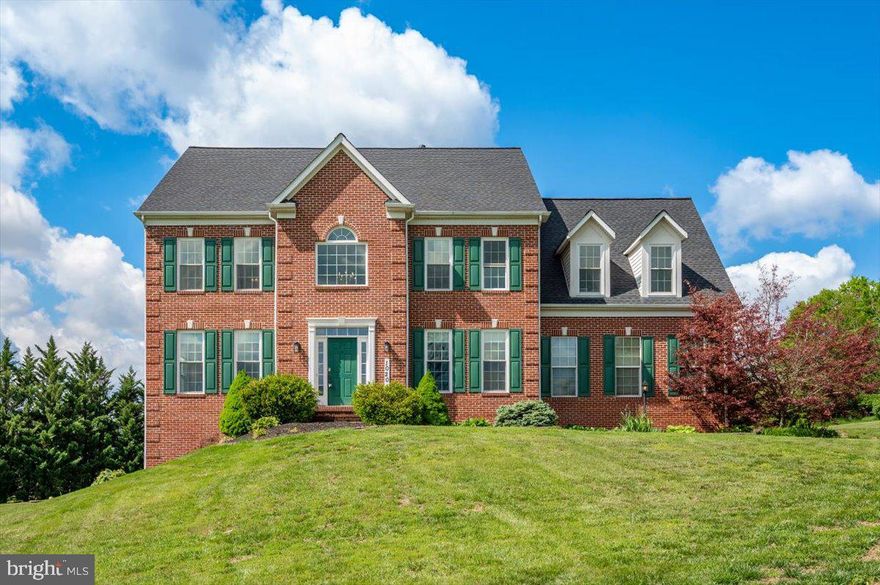 OPEN HOUSE - Today, Sunday, May 3rd from 1 PM to 3 PM!
Pure grandeur, timeless elegance, and quiet country living come together in this exceptional estate, beautifully positioned on 3.32 acres along a peaceful court with no through traffic. Built with brick on all four sides and framed by mountain views from the front of the home, this property offers an impressive sense of arrival, privacy, and presence from the moment you arrive.

Inside, the grand two story foyer sets the tone with soaring space, natural light, and a refined sense of style. The main level blends formal elegance with comfortable everyday living, offering beautiful spaces for gathering, entertaining, and relaxing at home. Formal living and dining areas create the perfect setting for special occasions, while the oversized family room flows effortlessly into the beautifully updated gourmet kitchen. With granite countertops, stainless steel appliances, double wall ovens, generous cabinetry, and a center island with gas cooktop, the kitchen is both polished and practical, designed to keep everyone connected.

Outdoor living is one of the true highlights of this home. The massive deck offers incredible space for dining, lounging, and entertaining, while the expansive inground pool area creates the feel of a private resort right at home. From summer afternoons by the pool to quiet evenings in the screened gazebo, this outdoor setting was made to be enjoyed. Beyond the pool area, the fenced garden is already tilled and ready for fresh vegetables, flowers, or your own farm to table vision.

The upper level continues the home’s grand yet comfortable feel. Double doors open into the primary owner suite, creating an elegant entrance to a private retreat with a tray ceiling, spacious sitting room, private laundry area and oversized walk in closet. The luxury bath adds to the sense of relaxation with dual vanities, a jetted soaking tub, private water closet, separate shower, and a skylight that fills the space with natural light by day and offers a glimpse of the starlit sky by night. The additional bedrooms offer wonderful flexibility, including private en suite options and the opportunity for a second primary suite. Overlooking the foyer below, the open upper landing adds to the airy and elegant feel of the home.

The lower level expands the home even further, with approximately two thirds of the space finished and ready to accommodate everyday living, entertaining, fitness, hobbies, guests, and more. Whether used for recreation, movie nights, a home gym, creative space, or a combination of needs, this level offers exceptional versatility along with a full bath, generous storage, workshop space, and utility and laundry area.

With no HOA, no city taxes, peaceful surroundings, and a convenient location minutes from Routes 70 and 66, this home offers the rare blend of privacy, elegance, space, and convenience. A Hagerstown address with Smithsburg living awaits at 10204 Easterday Court.