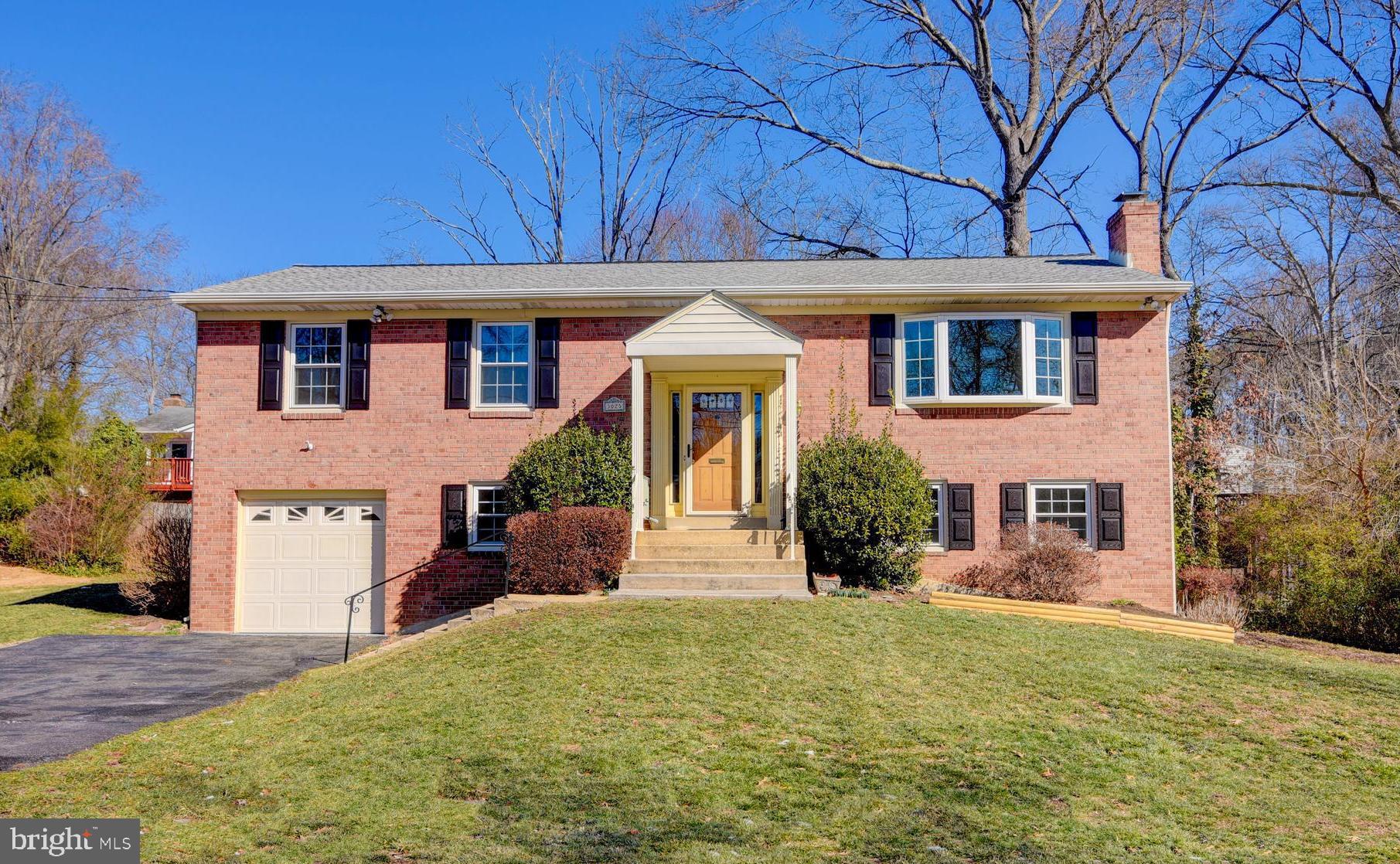 Expanded 4BR/3BA Riverside Estates Home w/ Garage! Freshly painted. Hardwoods on main level. Kitchen w/ breakfast room extension. Walkout LL rec rm w/ bar area & Gas FP (As-Is). Bonus LL 23x12 flex space for possible storage, workshop, exercise rm. Backyard w/ shed. Oversized garage w/ extra freezer & mudroom area. Mins to Ft Belvoir gates. Easy access to GW Parkway; convenient to Old Town, Pentagon, DC! Selling As-Is.
