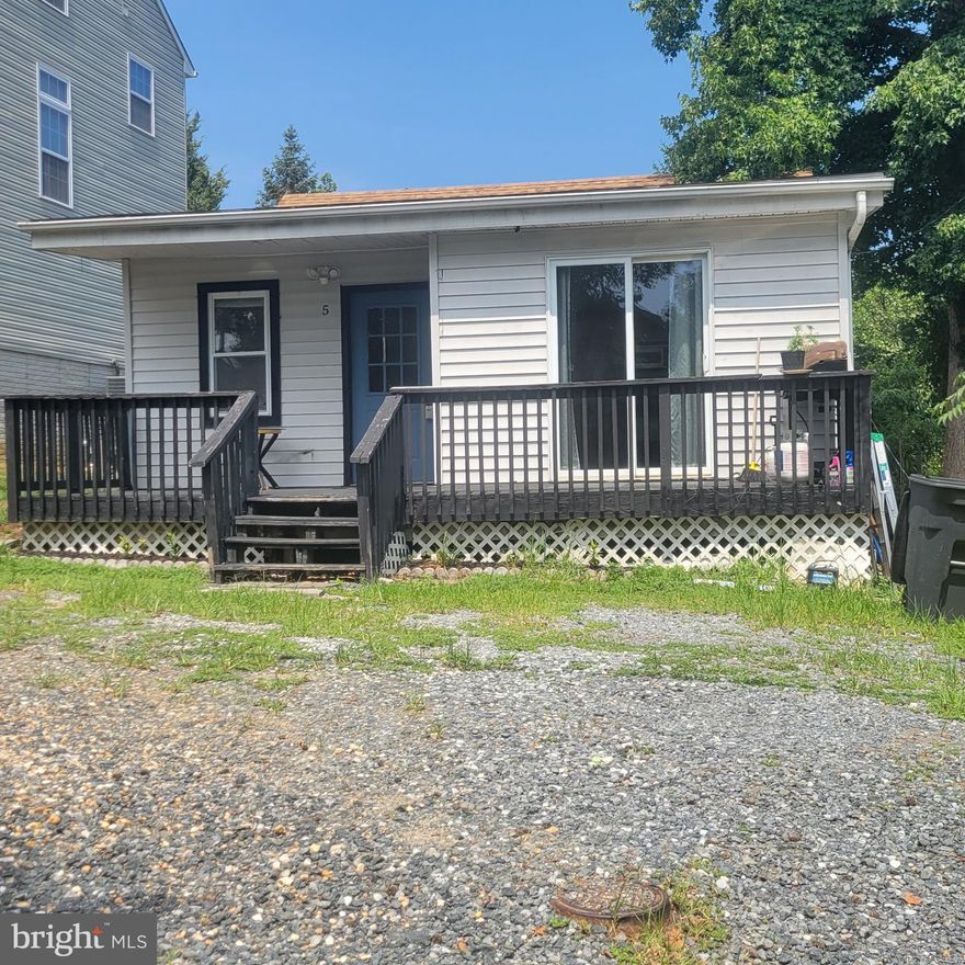 PERFECT OPPORTUNITY FOR INVESTORS, BUILDERS AND RENOVATORS.  2/3 bedroom home in this private waterfront community on the South River.  Less than a block to one of the three community piers. Spacious living area with large living room and open kitchen with eating area.  Endless possibilities.  Clean and very livable now or make it your own with a total renovation.   Special Community Taxing District for operating and maintaining the fantastic amenities that include beach, piers, boat ramp, playground, ballpark and community center.  No hoa. SOLD STRICTLY AS-IS.  Seller has set OFFER DEADLINE for Monday, July 22, 2024 at 5pm.